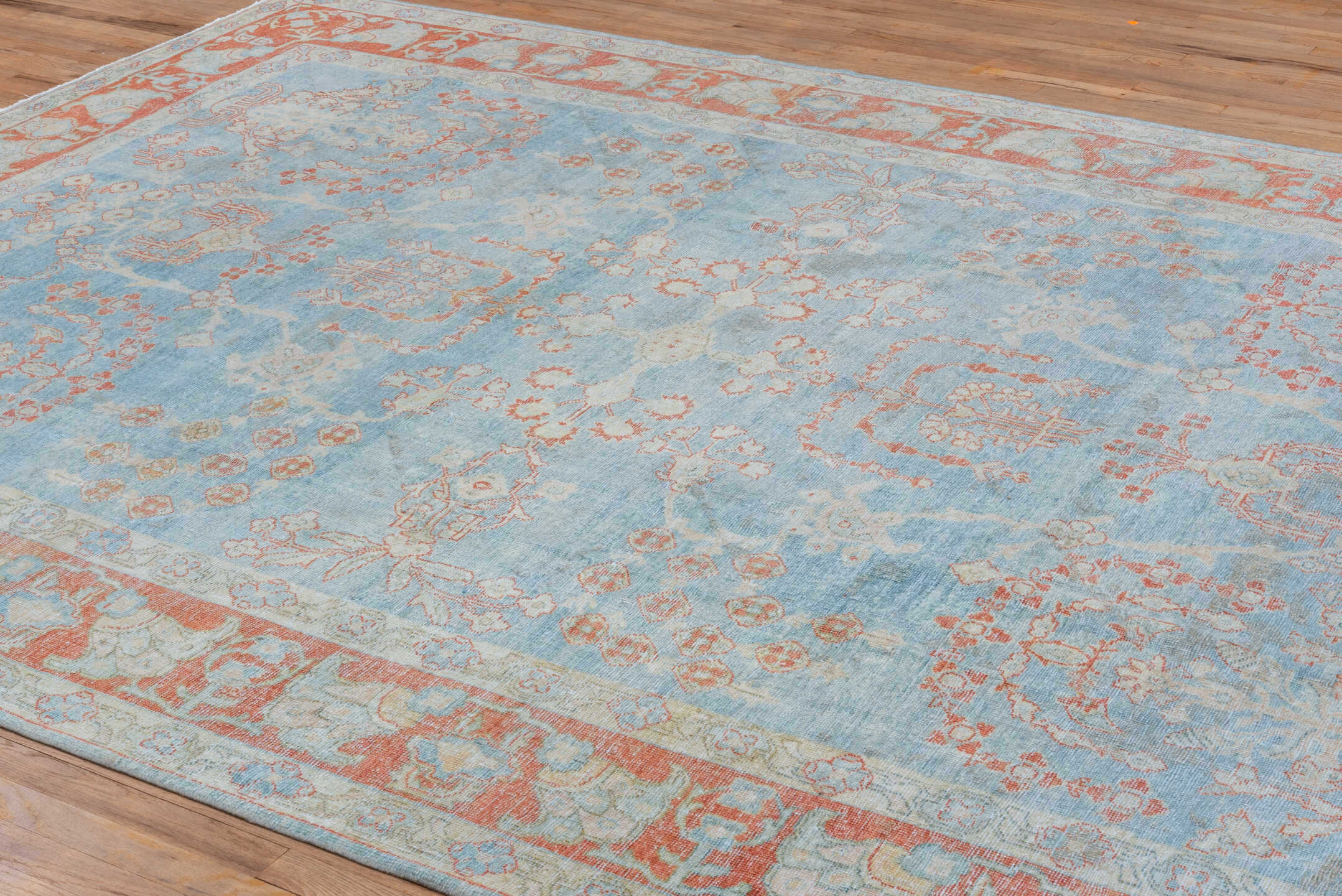 8' x 12' one-of-a-kind handmade vintage Mahal large size rug. Color palette: sky blue, ivory, rust, pale blue, coral, cream