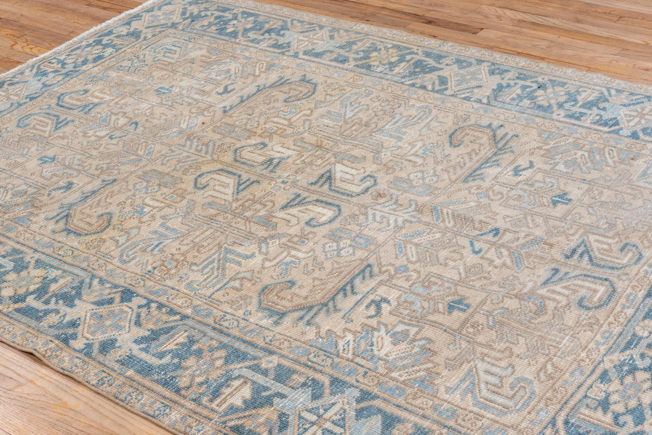 6' x 8' one-of-a-kind handmade vintage Heriz medium size rug. Color palette: ivory, sky blue, beige, taupe, cream