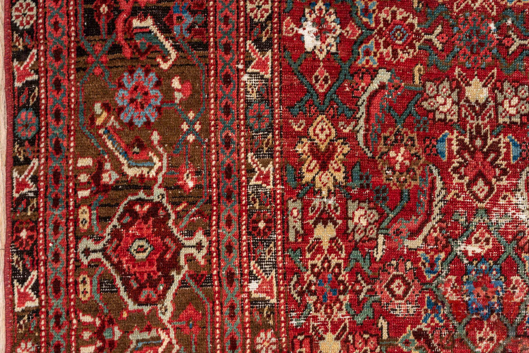5' x 9' one-of-a-kind handmade vintage Malayer medium size rug. Color palette: rust, brown, ivory, cobalt, terra cotta
