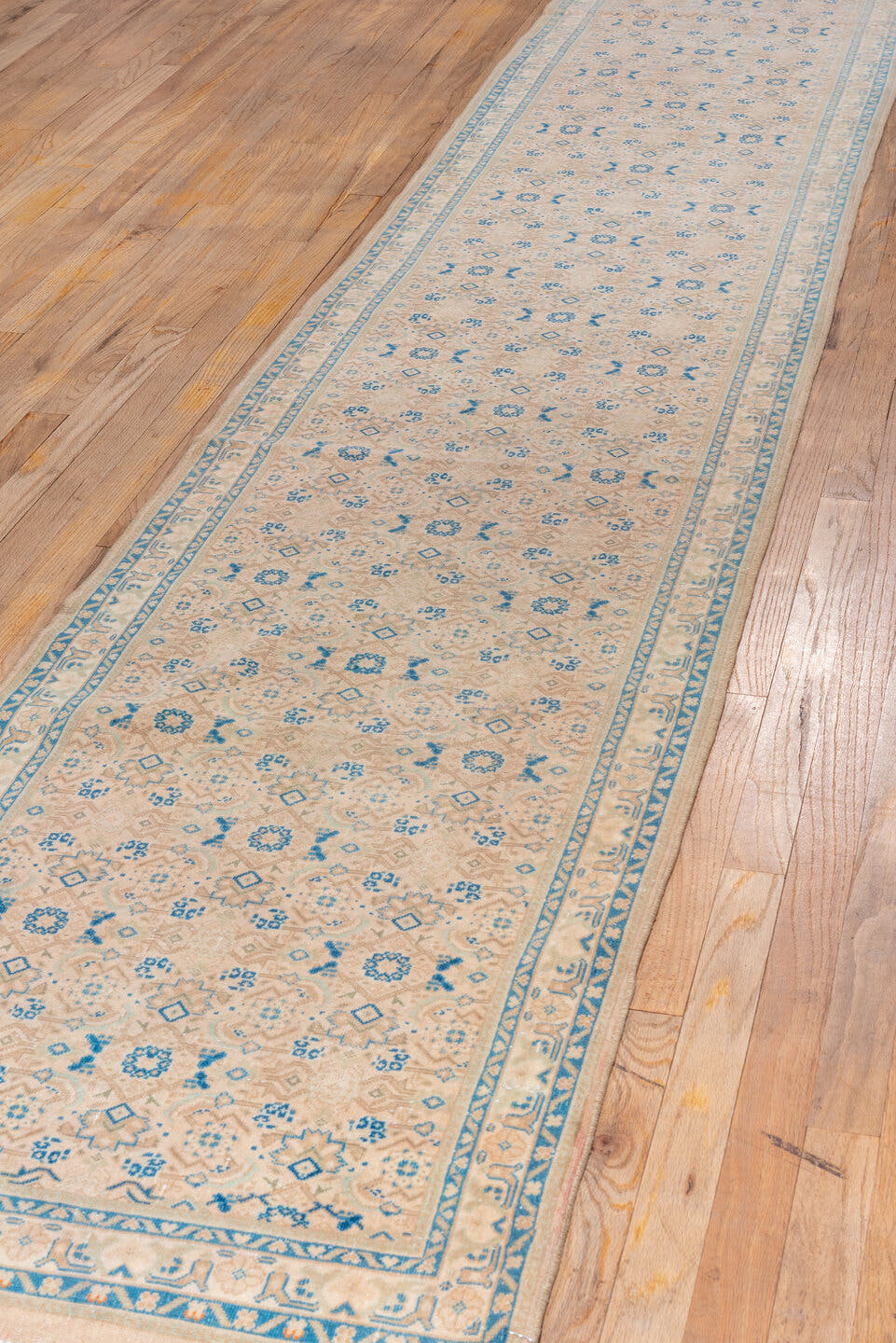 2' x 22' one-of-a-kind handmade vintage Tabriz runner rug. Color palette: ivory, sky blue, beige, camel, taupe, light blue