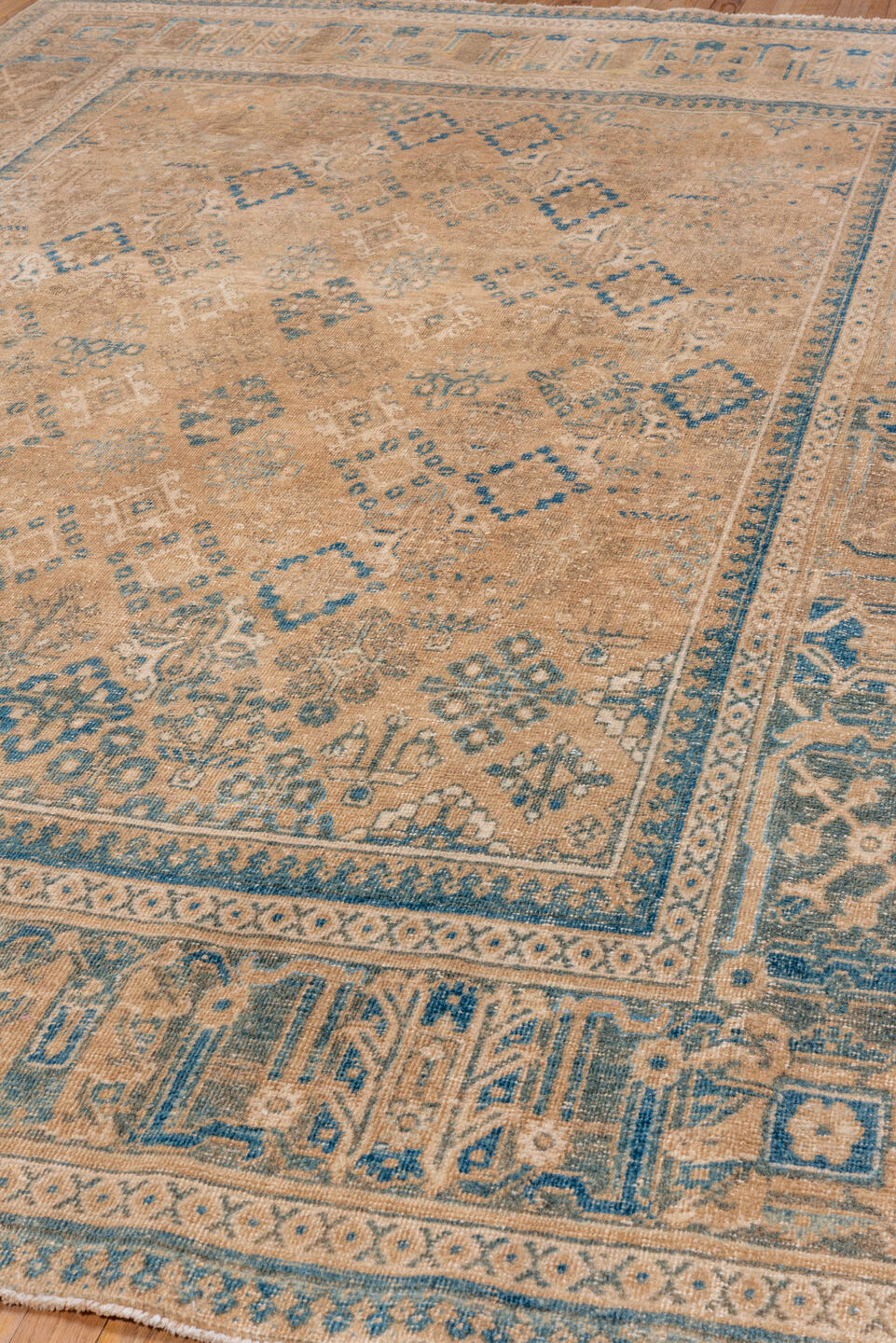 6' x 10' one-of-a-kind handmade vintage Joshegan large size rug. Color palette: camel, ivory, sky blue, taupe, beige