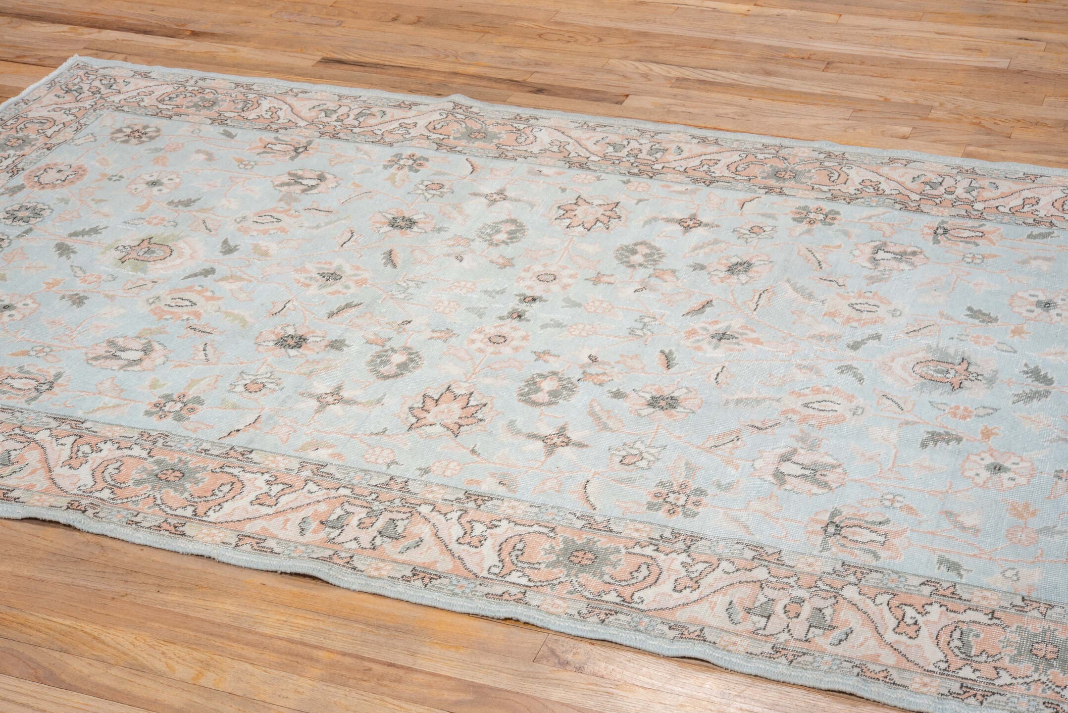 5' x 8' one-of-a-kind handmade vintage Oushak medium size rug. Color palette: pale blue, blush, ivory, sage, taupe, peach