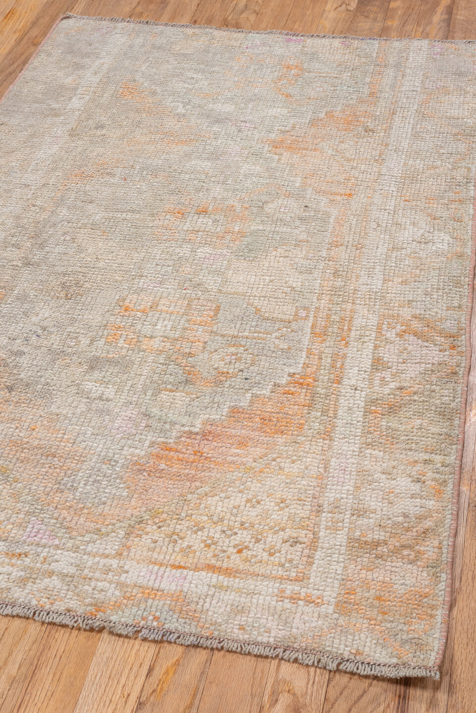 2' x 4' one-of-a-kind handmade vintage Oushak small size rug. Color palette: ivory, taupe, beige, peach, blush, muted gold