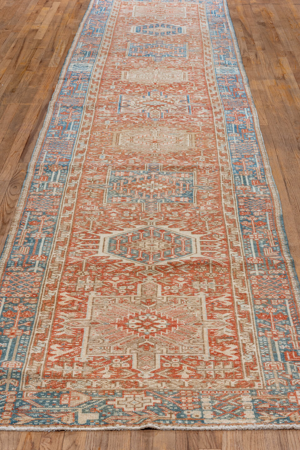 3' x 16' one-of-a-kind handmade vintage Karaje runner rug. Color palette: rust, sky blue, ivory, terracotta, camel, slate