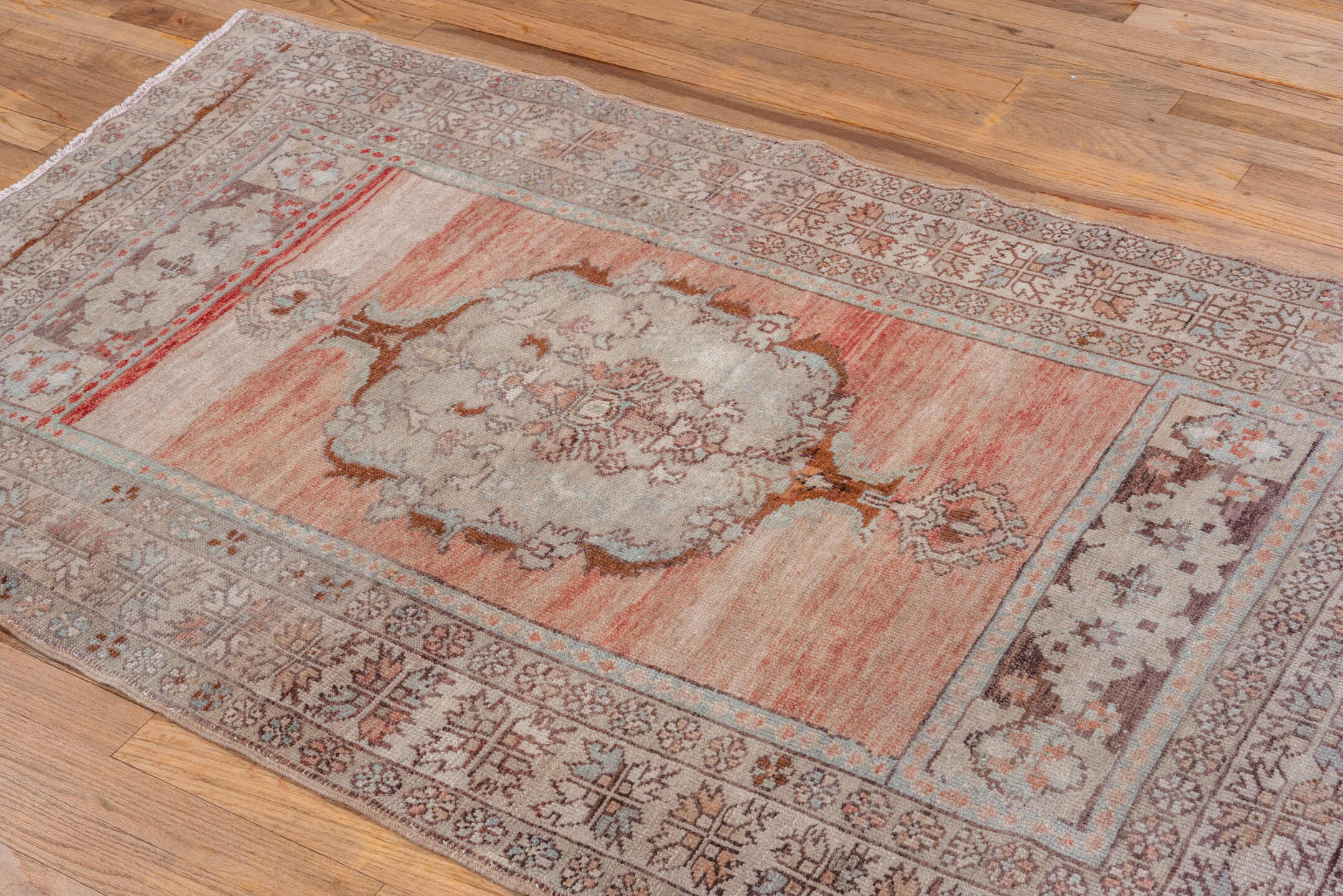 3' x 5' one-of-a-kind handmade vintage Oushak small size rug. Color palette: blush, ivory, taupe, camel, brown, pale blue