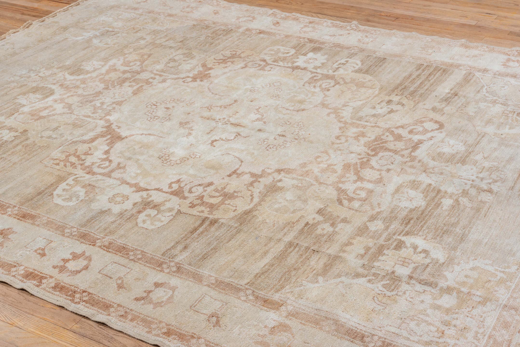 7' x 9' one-of-a-kind handmade vintage Oushak rug. Color palette: ivory, taupe, beige, blush, camel, cream, gray, pink