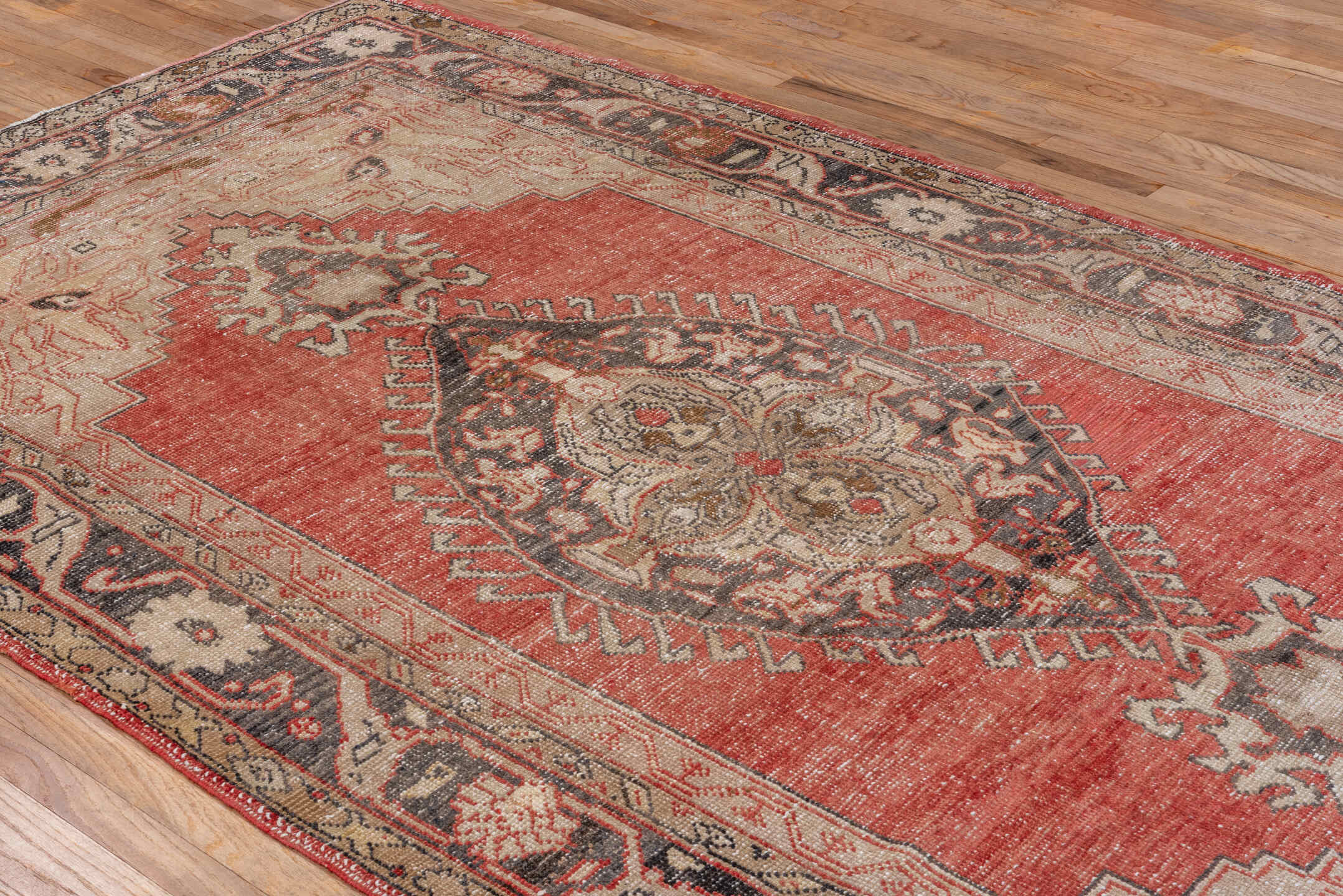 5' x 11' one-of-a-kind handmade vintage Oushak rug. Color palette: brown, gray, light gray, off-white, pink, red