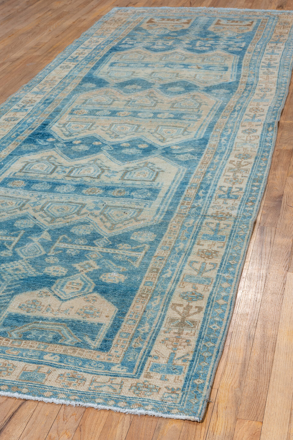 4' x 12' one-of-a-kind handmade vintage Bidjar runner rug. Color palette: blue, ivory, beige, camel, taupe, brown, gray