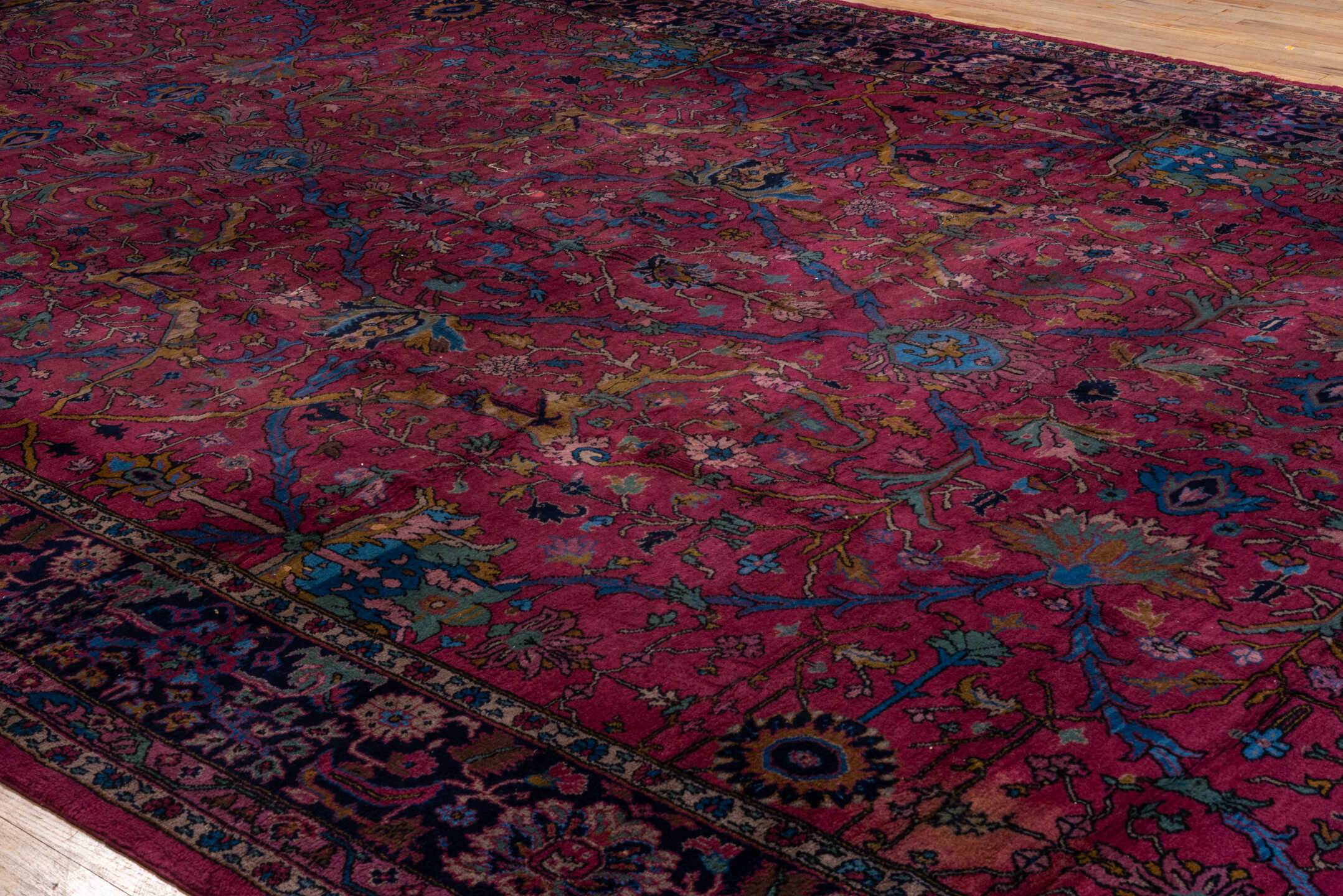 11' x 20' one-of-a-kind handmade vintage Agra oversize rug. Color palette: raspberry, navy, sky blue, rose, gold, burgundy