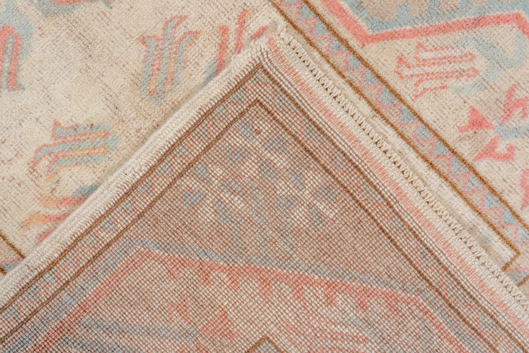 2' x 9' one-of-a-kind handmade vintage Oushak runner rug. Color palette: ivory, pale blue, blush, taupe, cream, peach
