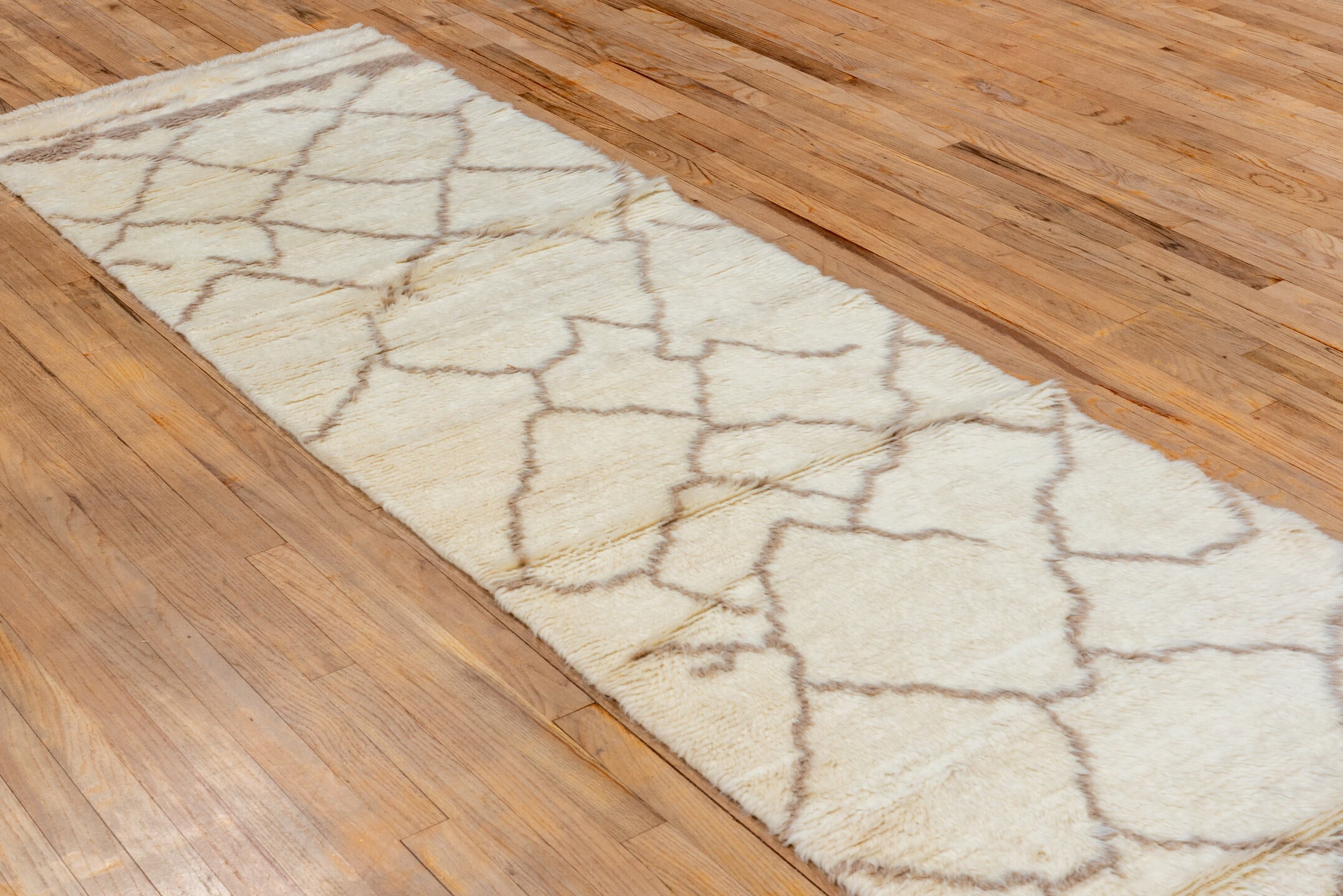 2' x 12' one-of-a-kind handmade vintage Moroccan runner rug. Color palette: ivory, taupe, cream, camel, beige, gray