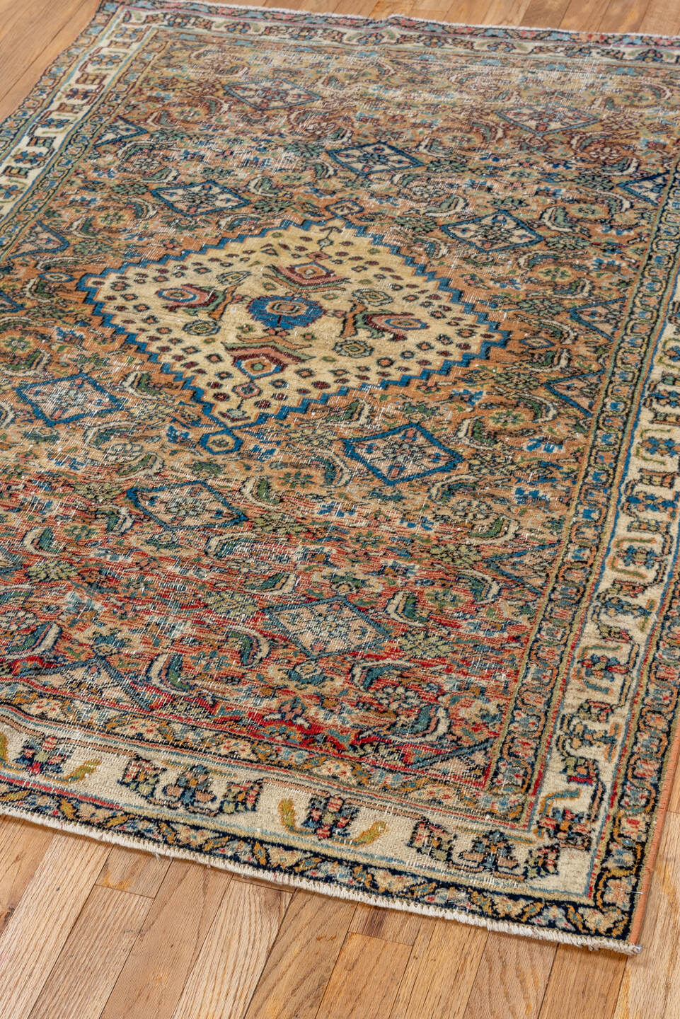 3' x 4' one-of-a-kind handmade vintage Khorassan small size rug. Color palette: ivory, camel, sky_blue, navy, rust, sage