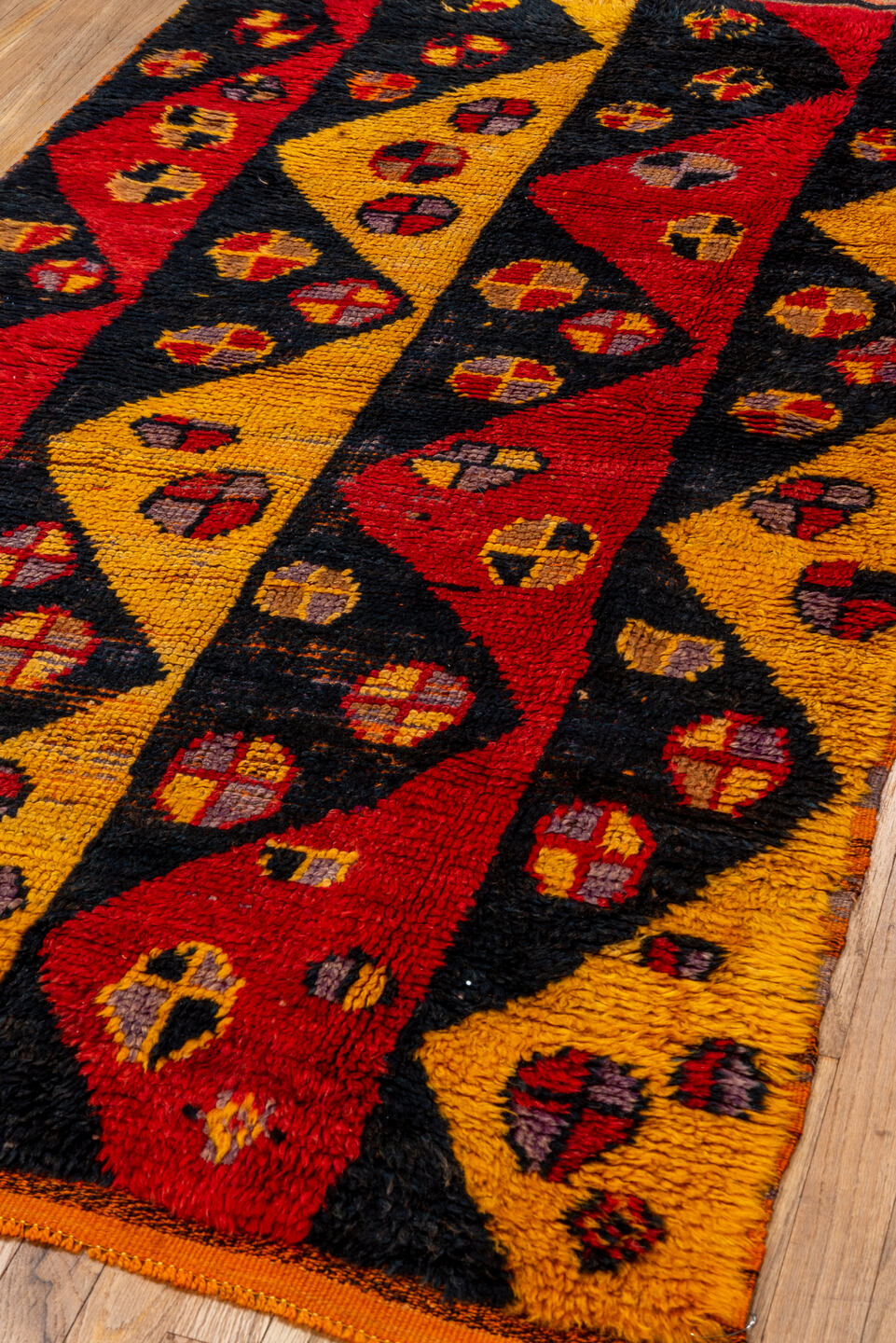 3' x 6' one-of-a-kind handmade vintage Tulu small size rug. Color palette: gold, black, crimson, rust, taupe, plum, red