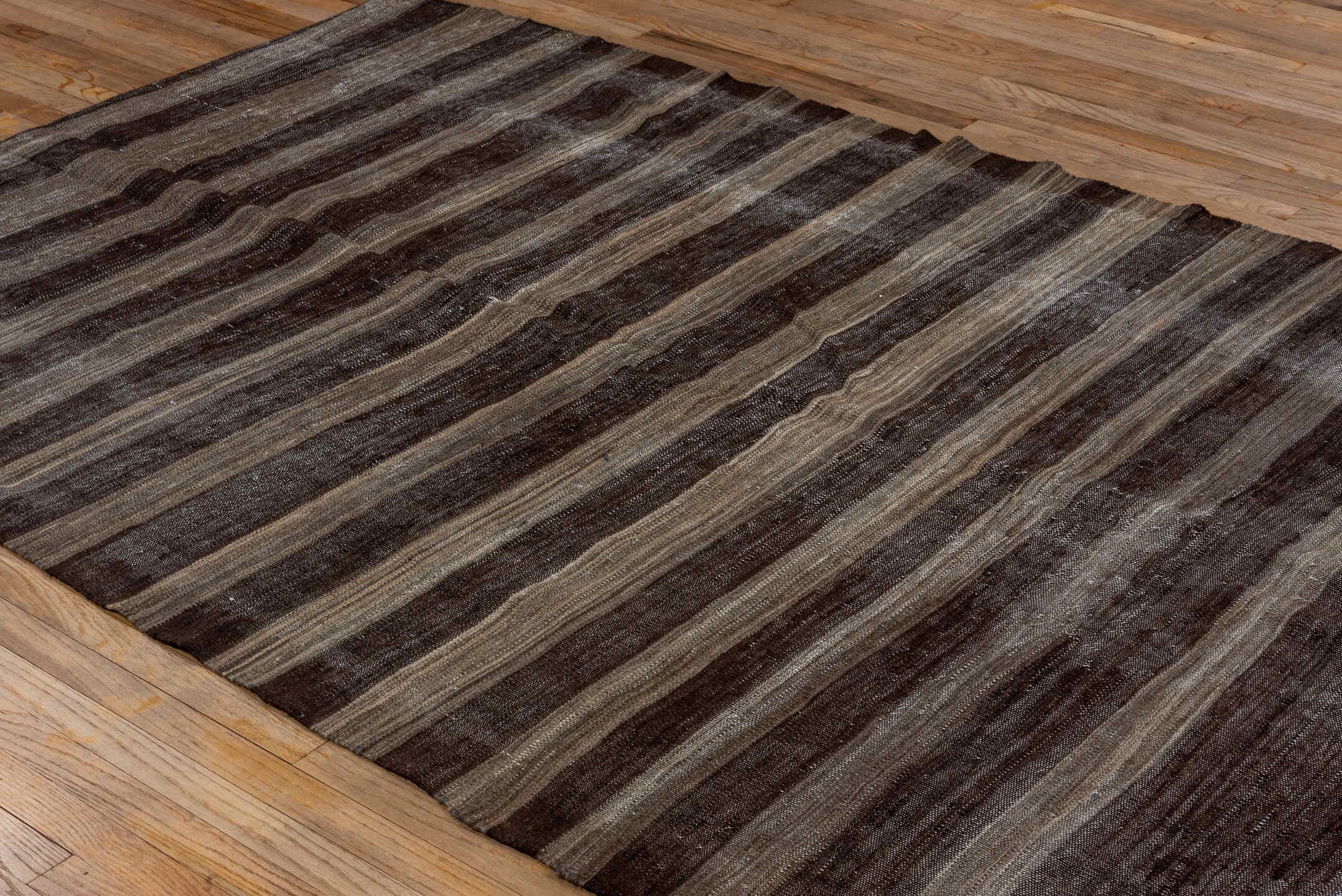 5' x 8' one-of-a-kind handmade vintage Kilim medium size rug. Color palette: charcoal, taupe, brown, gray, ivory, black