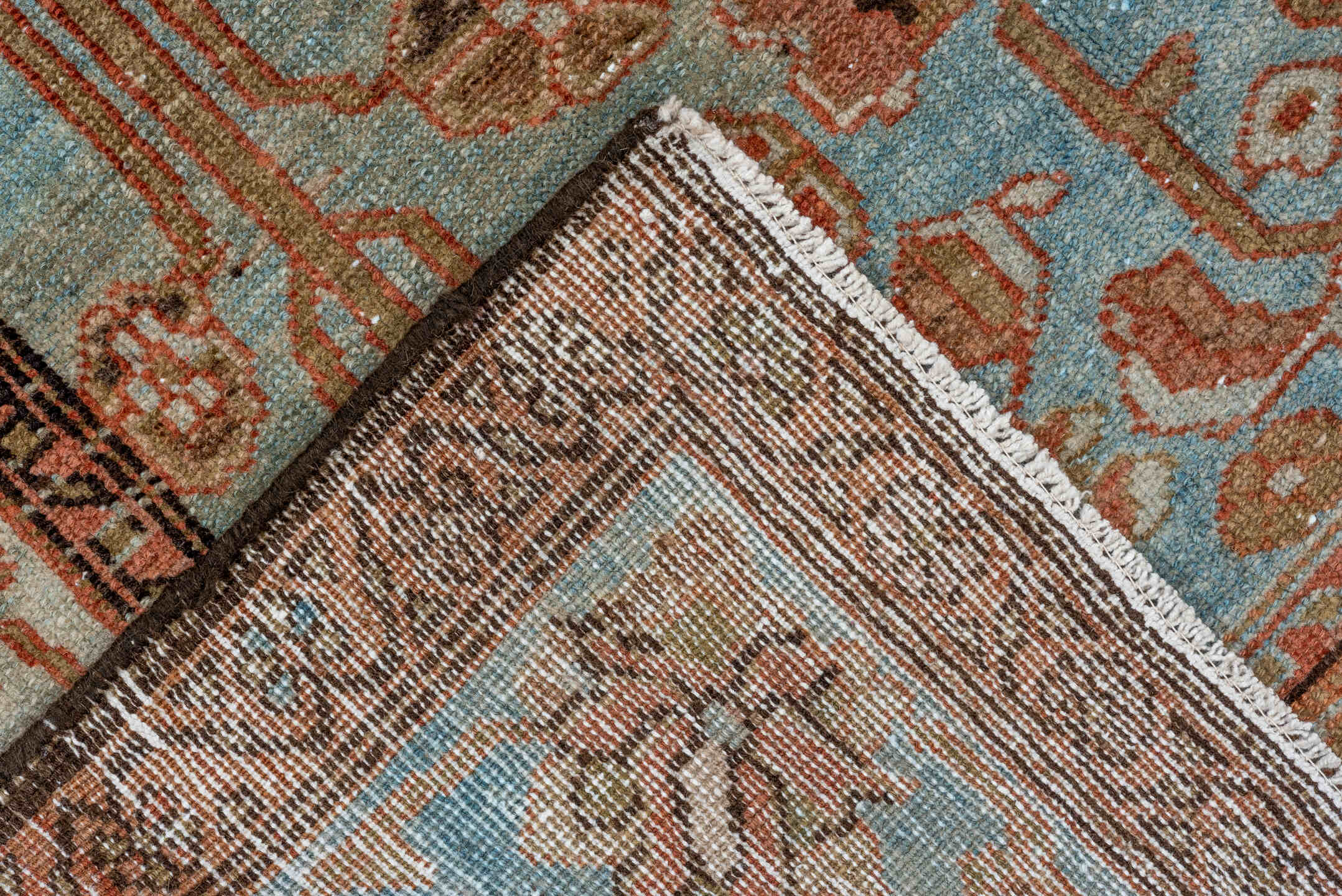 5' x 9' one-of-a-kind handmade vintage Lilian medium size rug. Color palette: light blue, ivory, rust, camel, taupe, brown