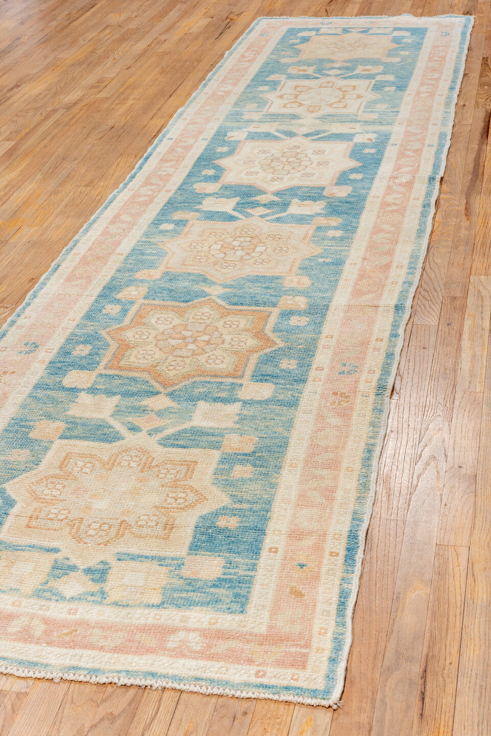 3' x 13' one-of-a-kind handmade vintage Oushak runner rug. Color palette: sky blue, blush, ivory, cream, peach, light blue