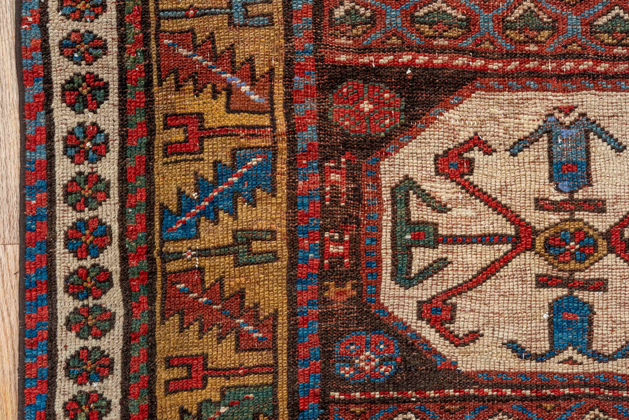 3' x 12' one-of-a-kind handmade vintage Kurd runner rug. Color palette: black, blue, brown, gray, off-white, orange, red