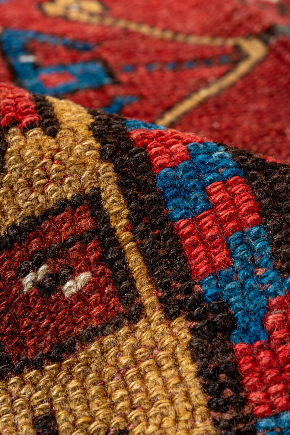 3' x 12' one-of-a-kind handmade vintage Kurd runner rug. Color palette: black, blue, brown, gray, off-white, orange, red