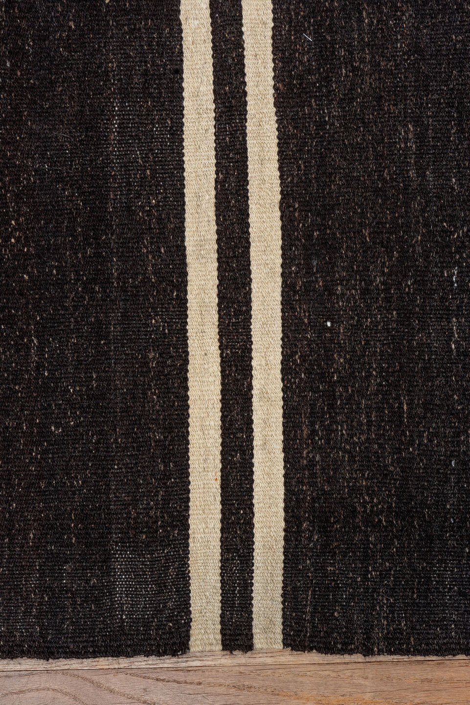 5' x 11' one-of-a-kind handmade vintage rug. Color palette: charcoal, ivory, ebony, gray, black