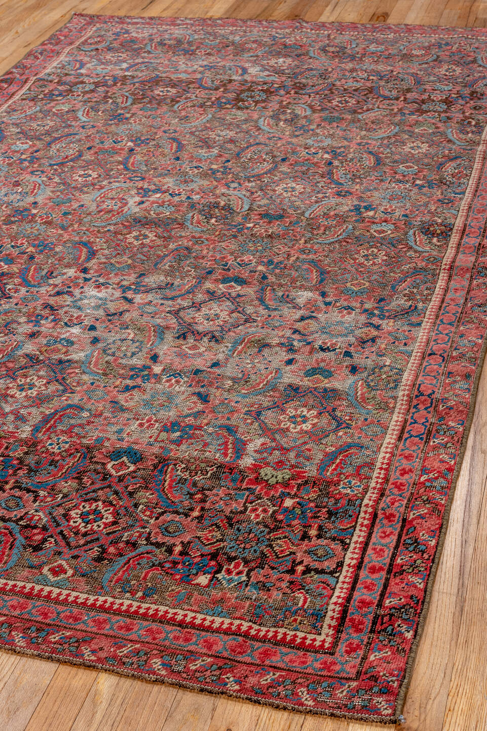 5' x 9' one-of-a-kind handmade vintage Bakhshayesh medium size rug. Color palette: blue, brown, gray, off-white, orange