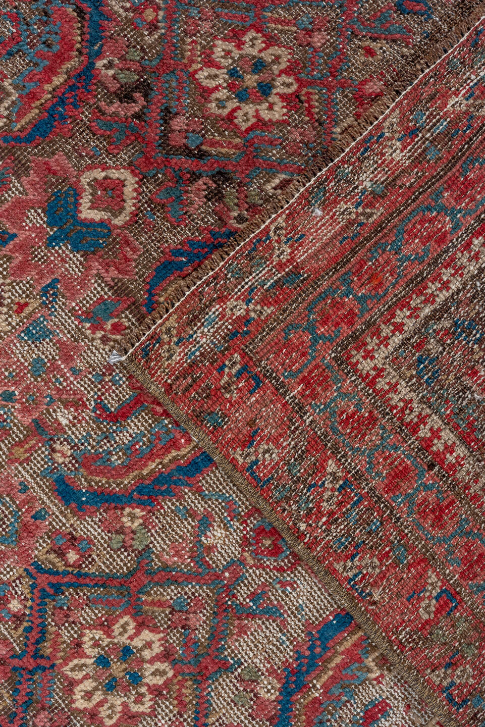 5' x 9' one-of-a-kind handmade vintage Bakhshayesh medium size rug. Color palette: blue, brown, gray, off-white, orange