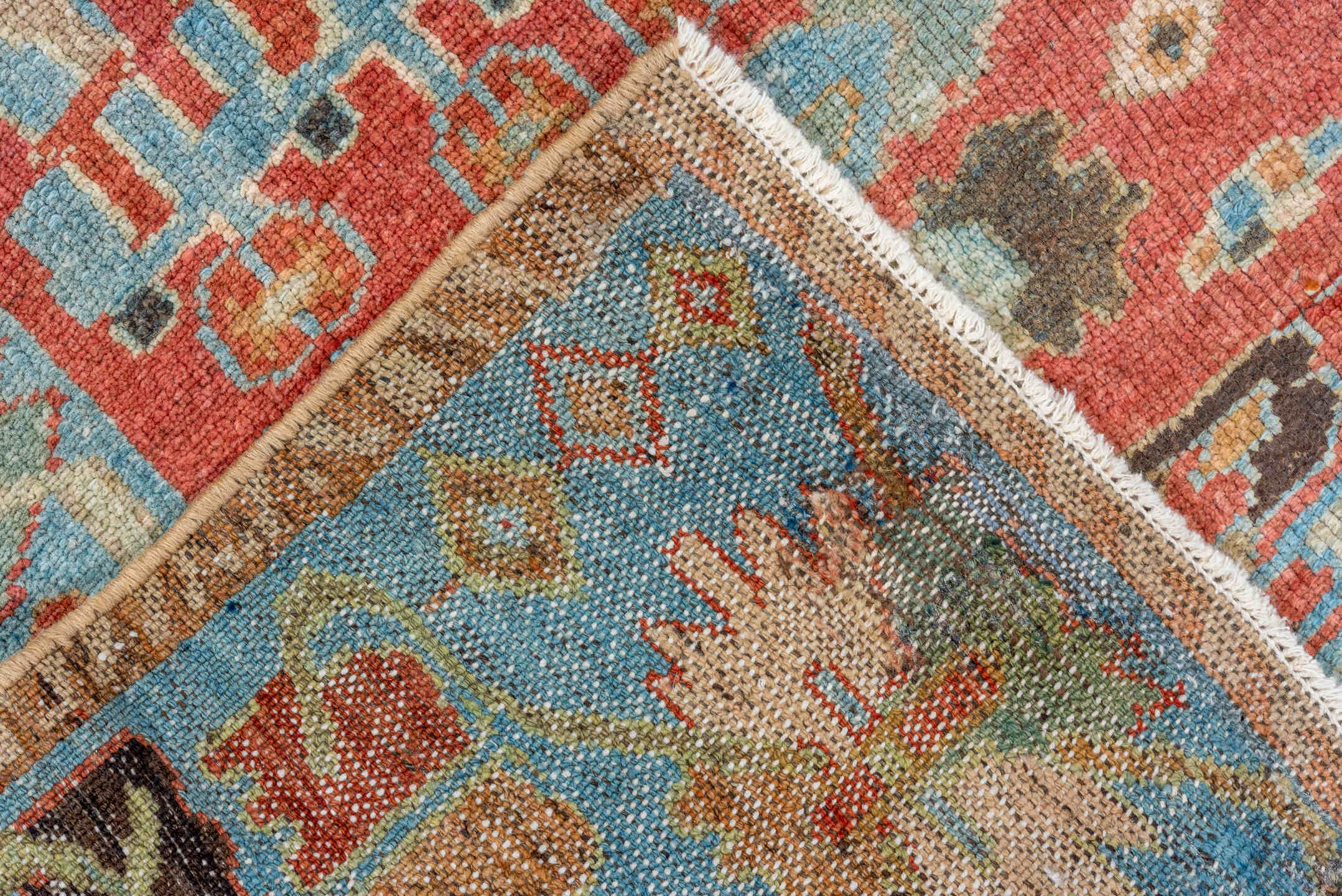 5' x 9' one-of-a-kind handmade vintage Lilian medium size rug. Color palette: coral, sky blue, ivory, taupe, rust, brown