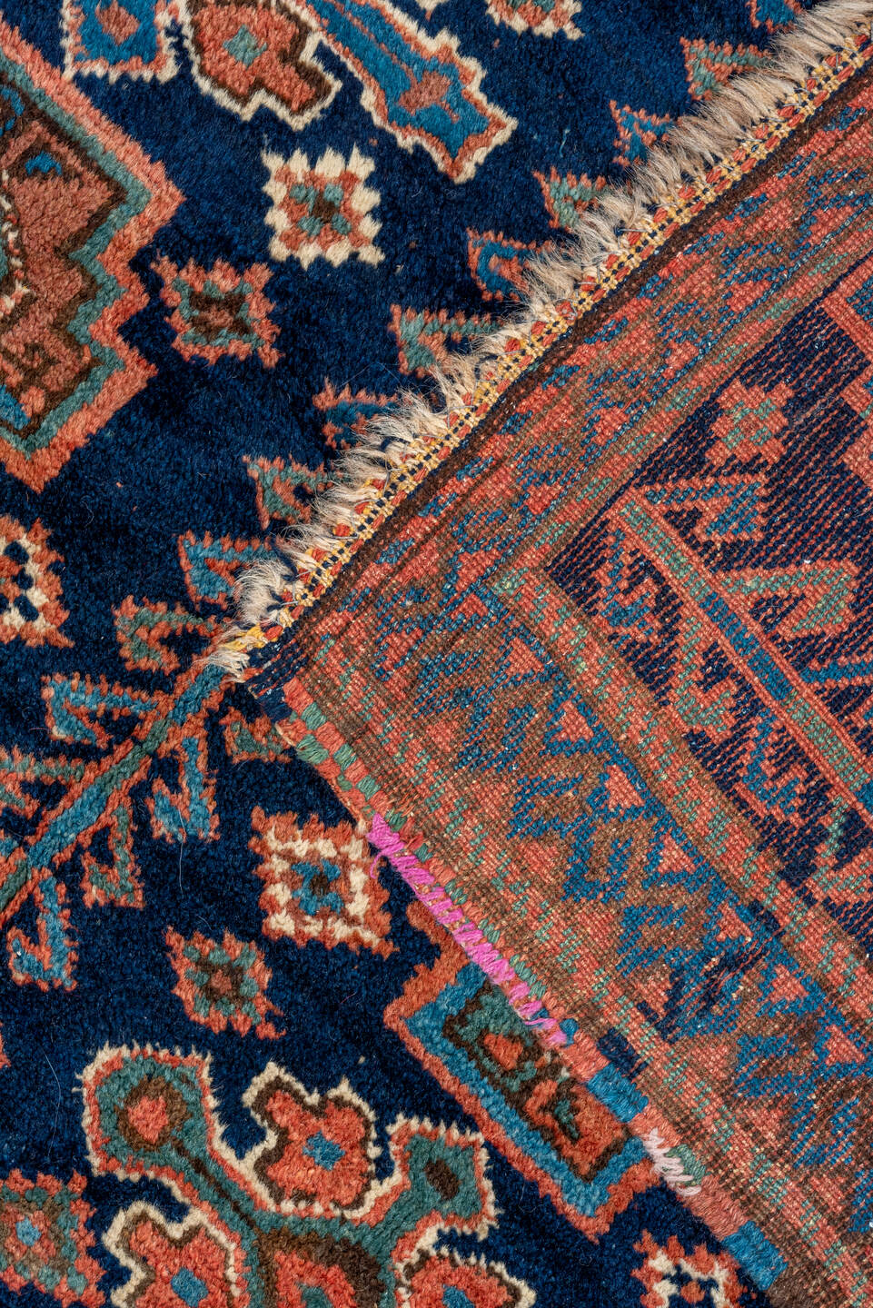 4' x 5' one-of-a-kind handmade vintage Kurd small size rug. Color palette: navy, turquoise, rust, ivory, coral, camel, blue