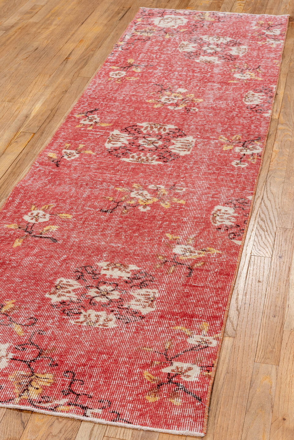 2' x 8' one-of-a-kind handmade vintage Oushak runner rug. Color palette: brown, off-white, orange, pink, red, redwood