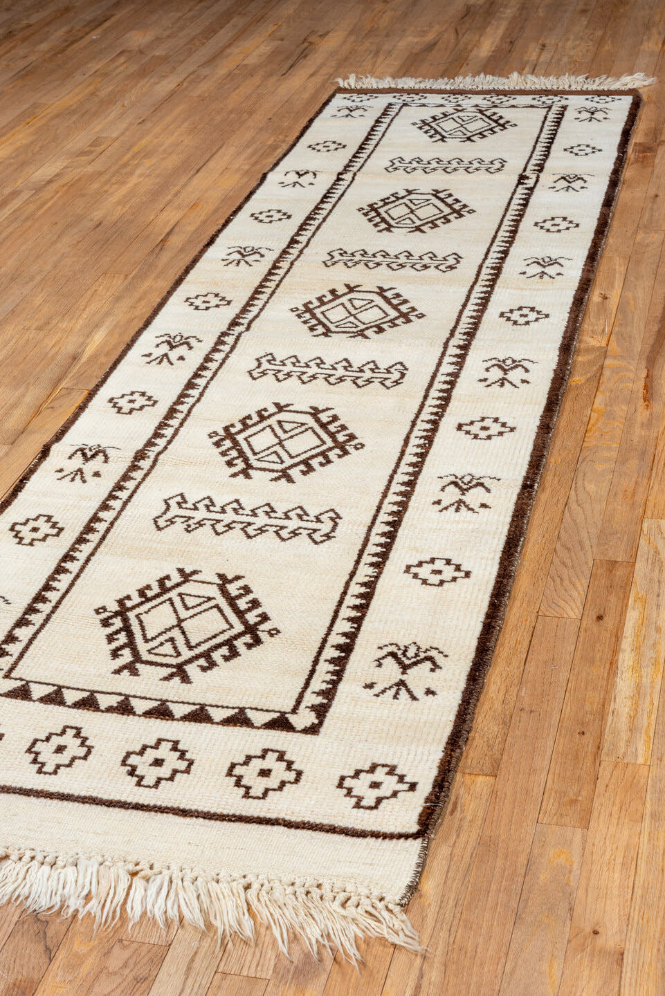 2' x 9' one-of-a-kind handmade vintage Kars runner rug. Color palette: ivory, brown, camel, taupe, beige, gray