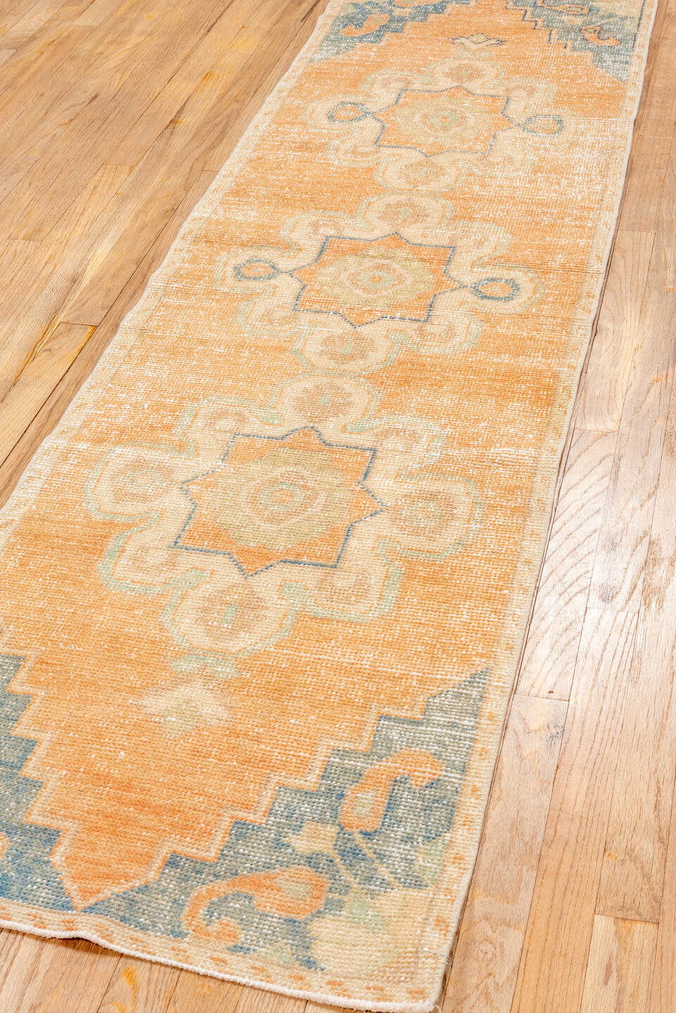 2' x 8' one-of-a-kind handmade vintage Oushak runner rug. Color palette: apricot, ivory, slate blue, beige, peach, taupe