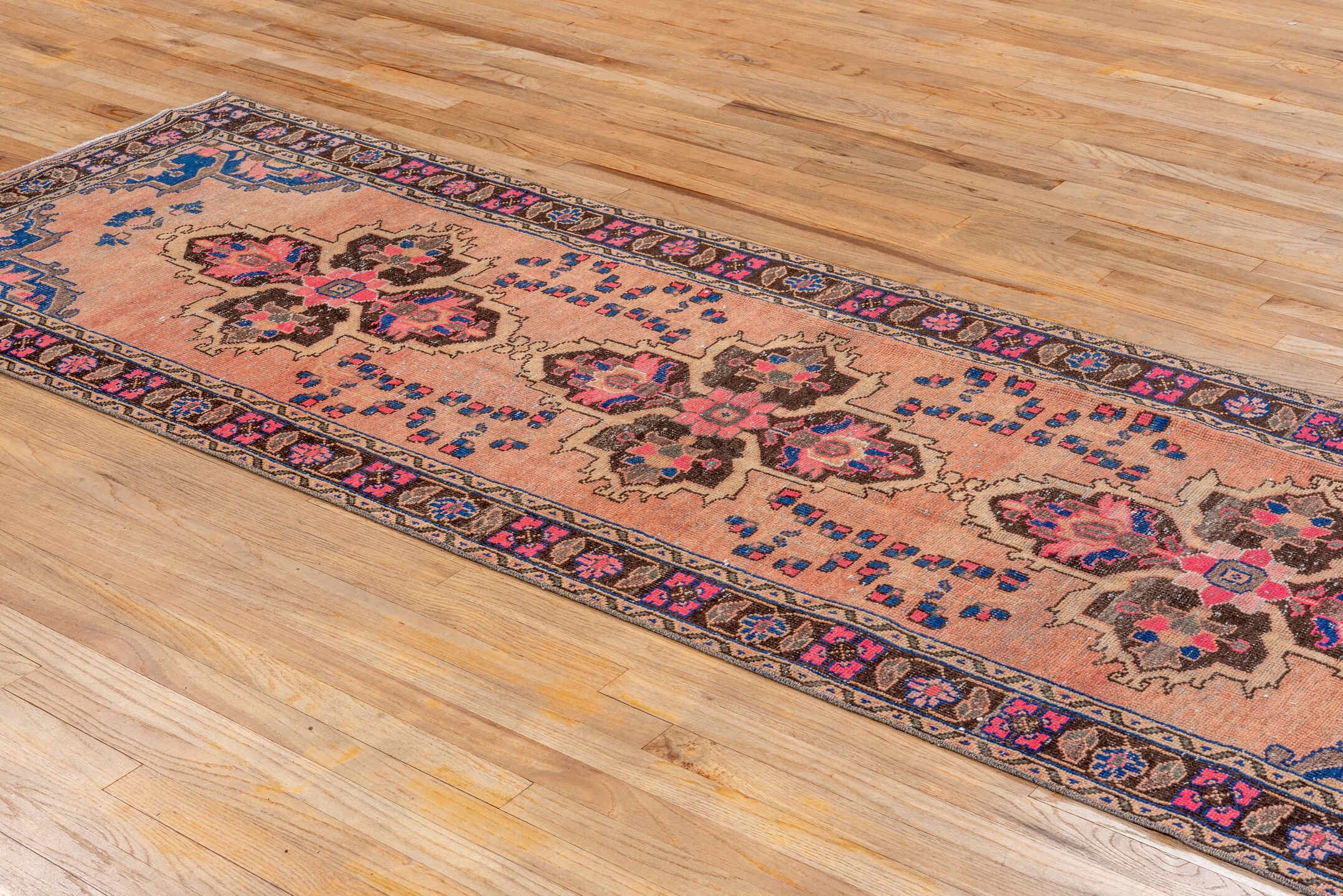 3' x 10' one-of-a-kind handmade vintage Oushak runner rug. Color palette: blush, brown, navy, pink, taupe, ivory, cobalt