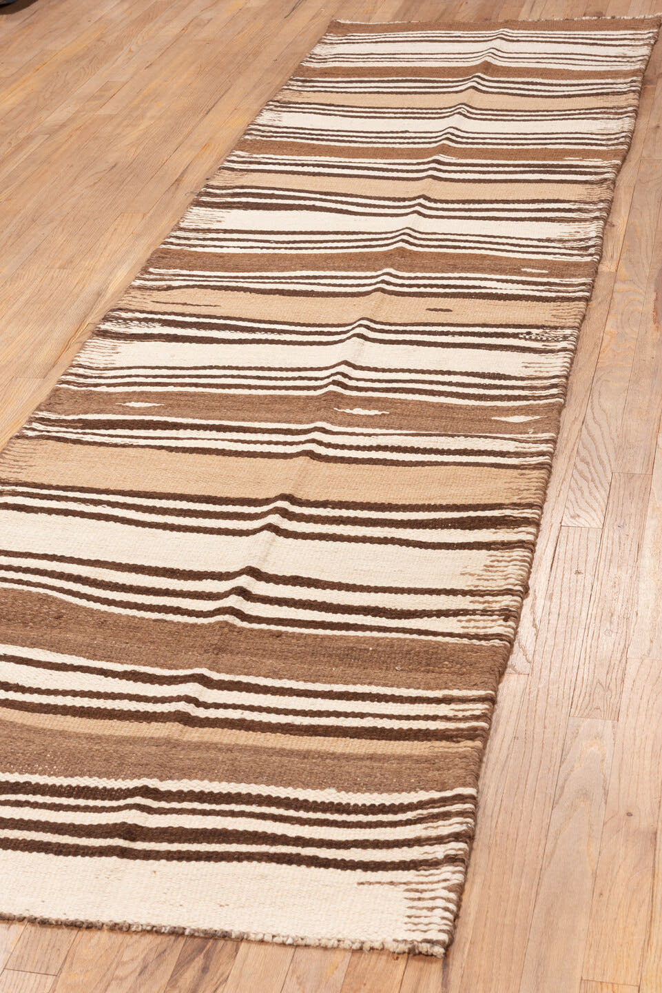 2' x 10' one-of-a-kind handmade vintage Kilim runner rug. Color palette: brown, ivory, camel, taupe, beige, gray