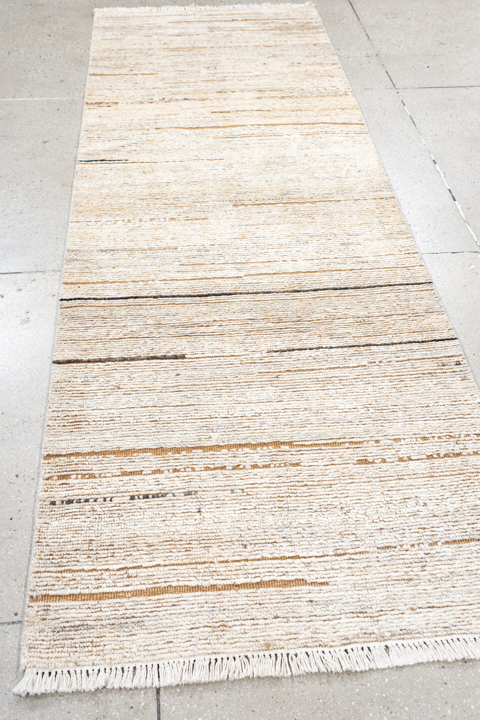 3' x 9' one-of-a-kind handmade vintage Tulu runner rug. Color palette: ivory, cream, camel, taupe, charcoal, beige, gray
