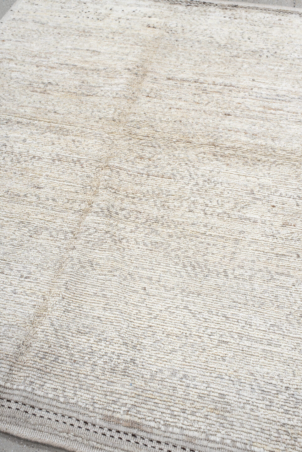 5' x 7' one-of-a-kind handmade vintage Tulu rug. Color palette: ivory, cream, taupe, charcoal, beige, gray, black