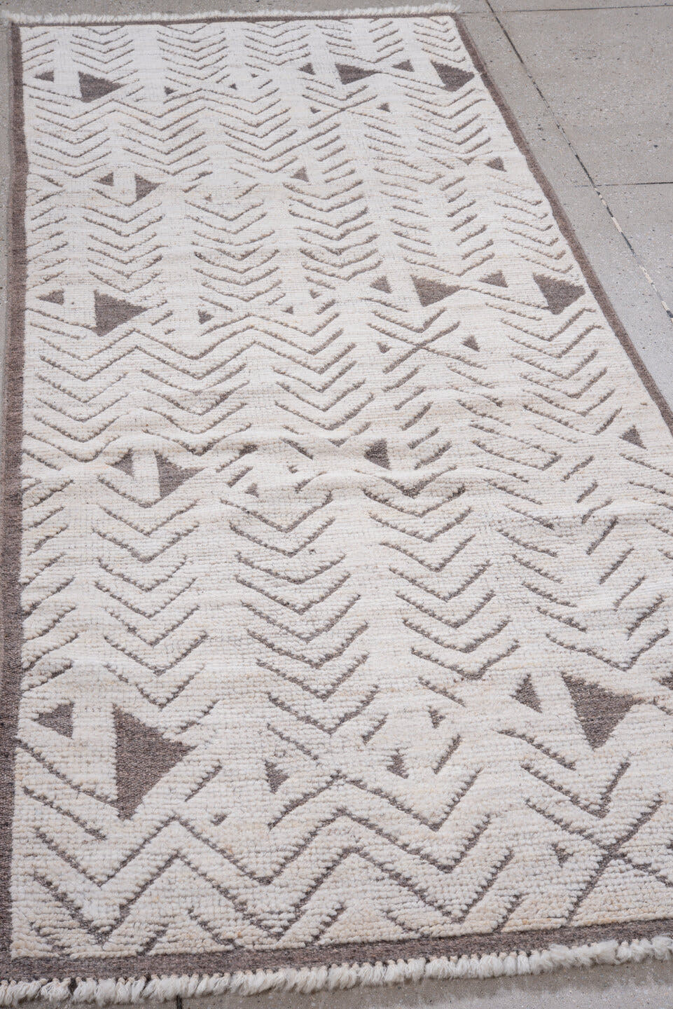 3' x 9' one-of-a-kind handmade vintage Tulu runner rug. Color palette: ivory, taupe, brown, beige, gray
