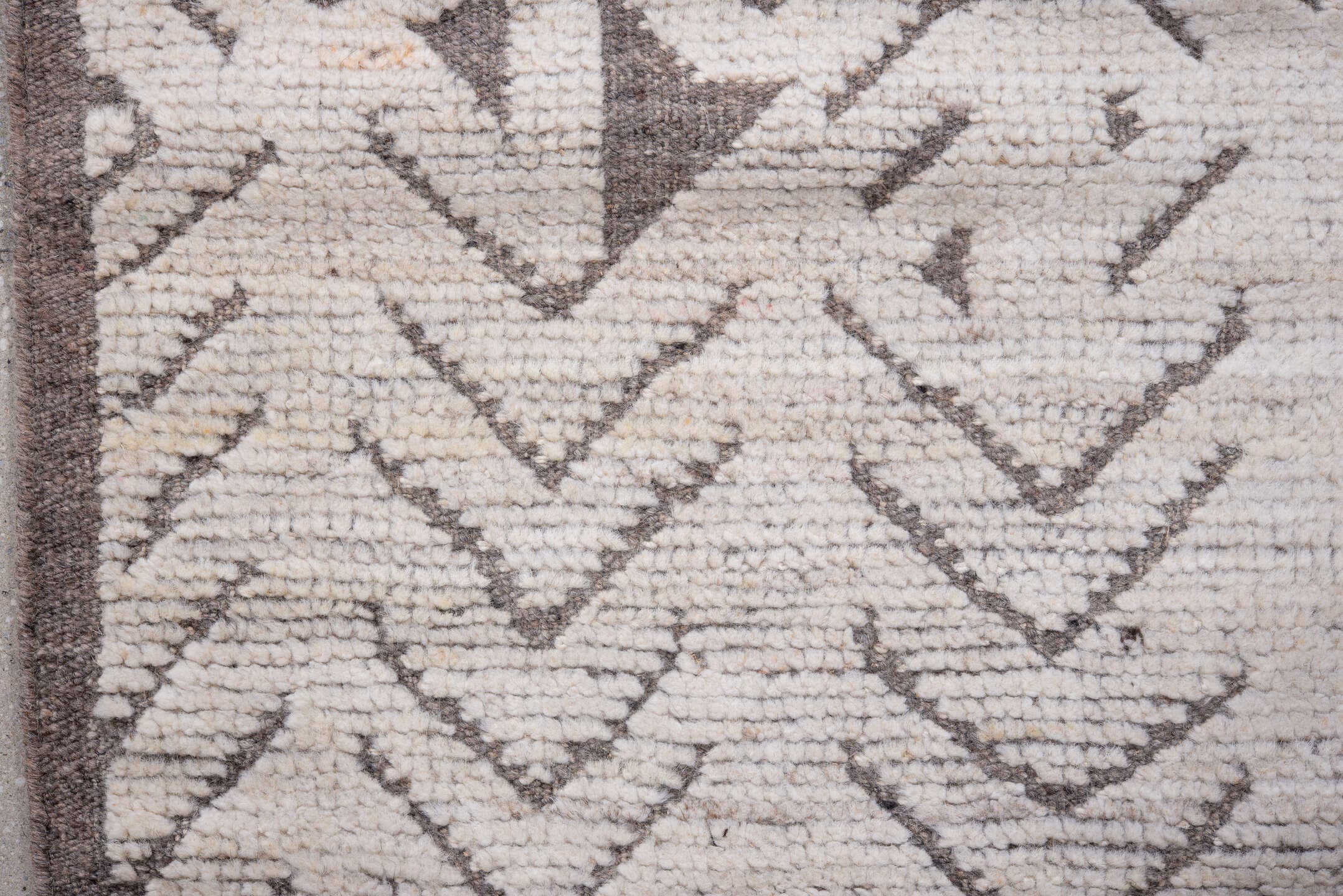 3' x 9' one-of-a-kind handmade vintage Tulu runner rug. Color palette: ivory, taupe, brown, beige, gray