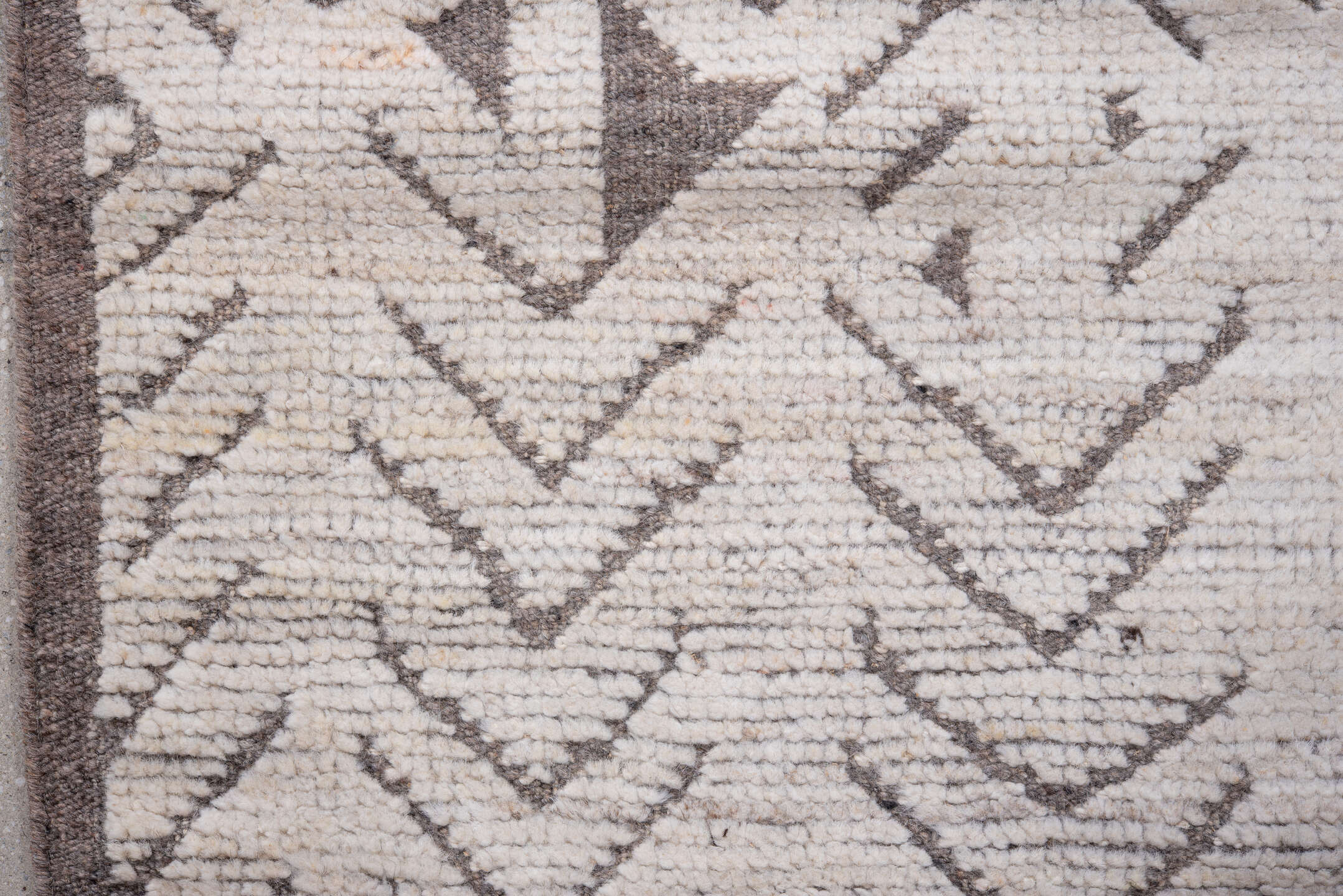 3' x 9' one-of-a-kind handmade vintage Tulu runner rug. Color palette: ivory, taupe, brown, beige, gray