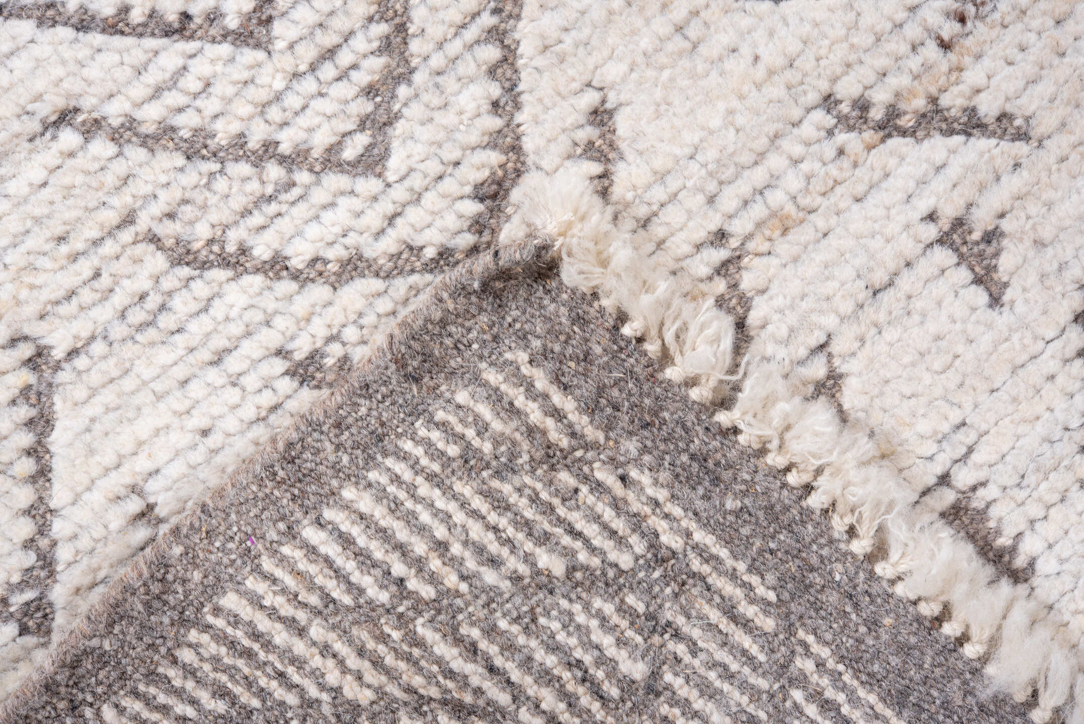 3' x 9' one-of-a-kind handmade vintage Tulu runner rug. Color palette: ivory, taupe, brown, beige, gray