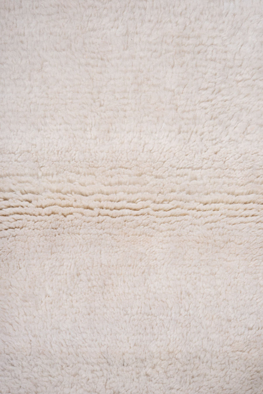 3' x 5' one-of-a-kind handmade vintage Shag small size rug. Color palette: ivory, cream