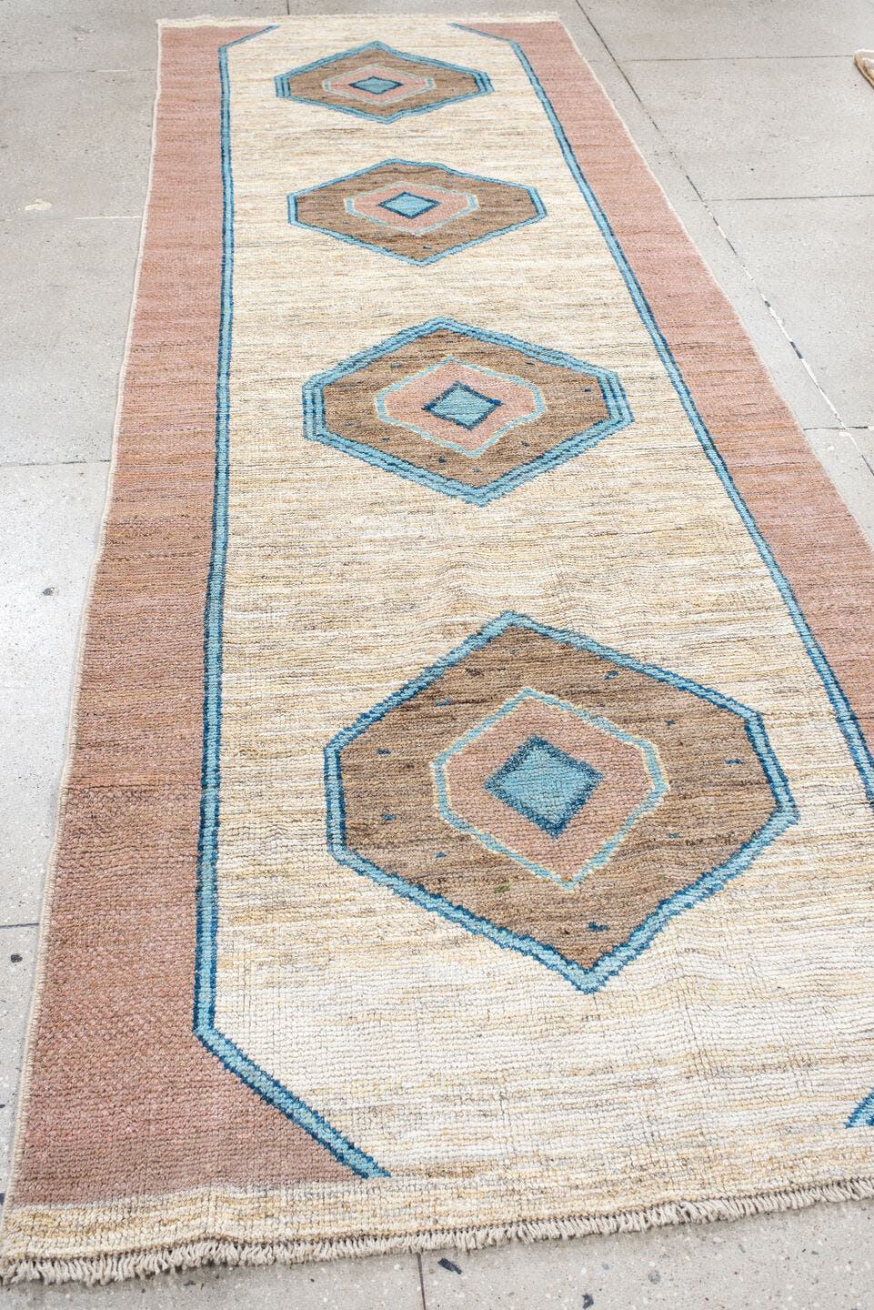 3' x 12' one-of-a-kind handmade vintage Oushak runner rug. Color palette: ivory, rose, sky_blue, taupe, camel, pink, red