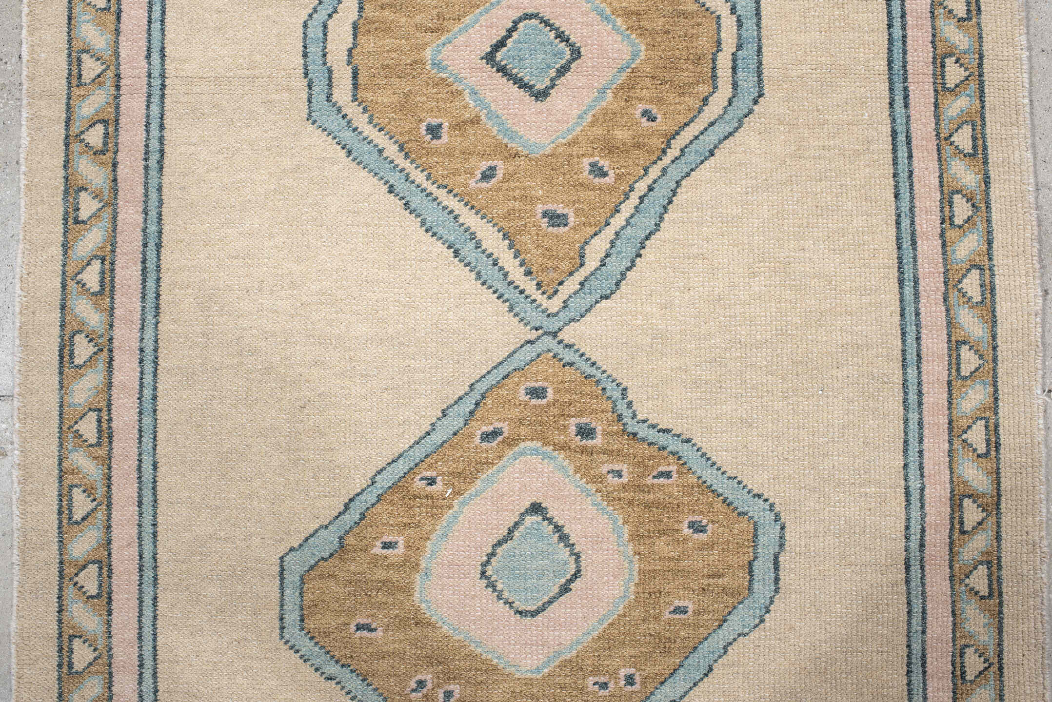 4' x 11' one-of-a-kind handmade vintage Oushak runner rug. Color palette: ivory, sand, pale blue, blush, taupe, beige