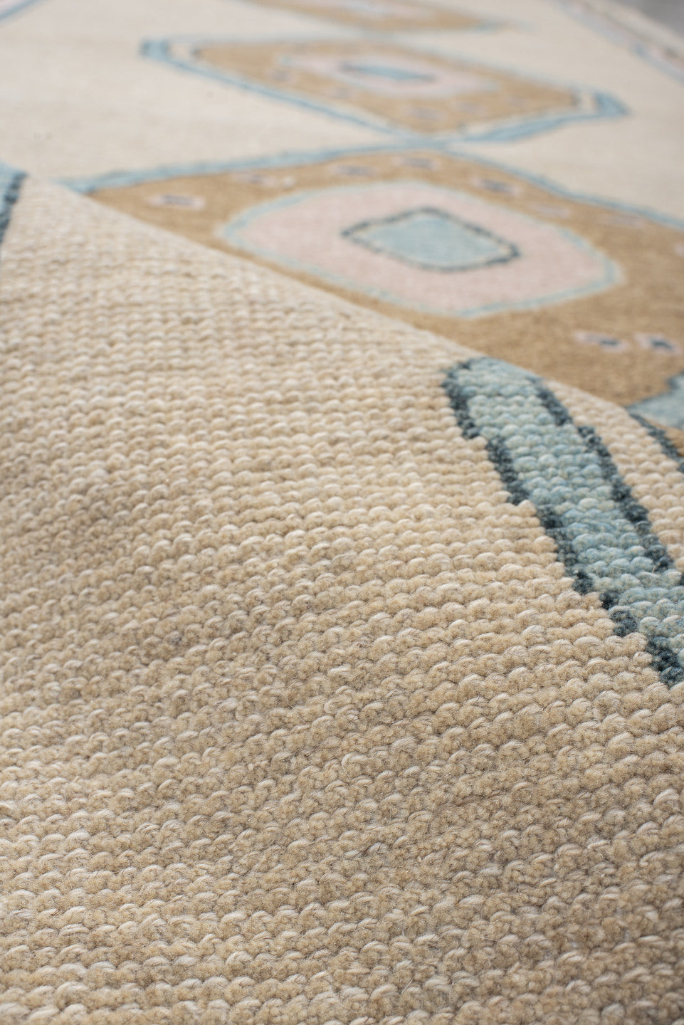 4' x 11' one-of-a-kind handmade vintage Oushak runner rug. Color palette: ivory, sand, pale blue, blush, taupe, beige