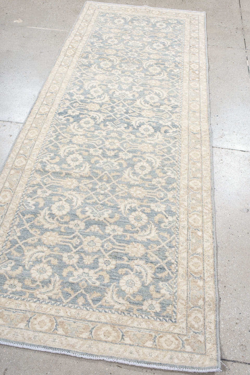 3' x 8' one-of-a-kind handmade vintage Tabriz runner rug. Color palette: ivory, pale blue, cream, beige, taupe, light blue
