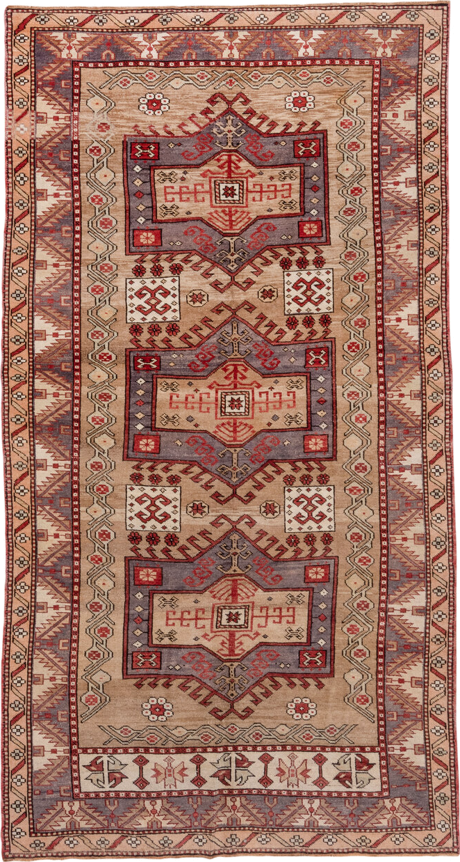 5' x 10' one-of-a-kind handmade vintage Kars medium size rug. Color palette: tan, rust, ivory, lavender, brick, taupe