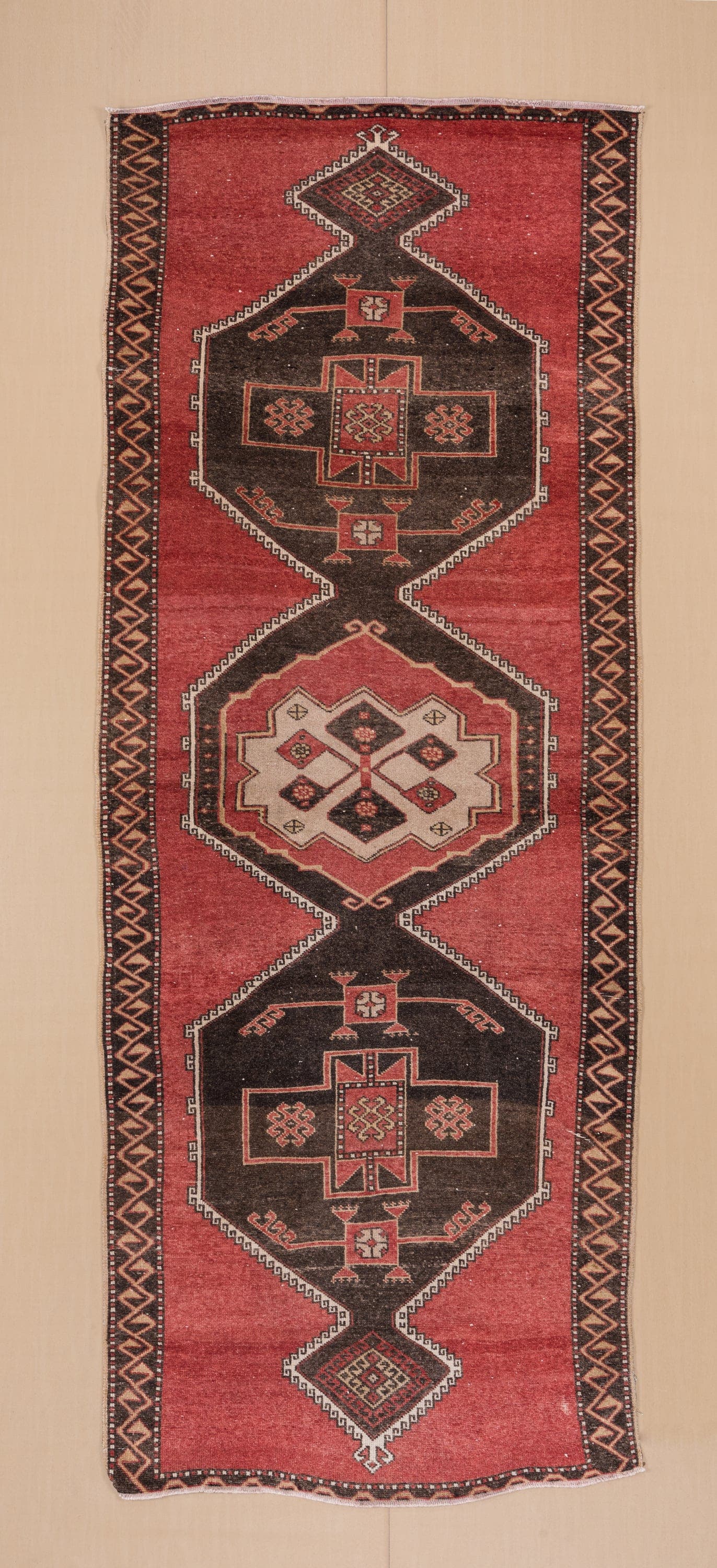 4' x 11' one-of-a-kind handmade vintage Oushak runner rug. Color palette: rust, charcoal, ivory, rose, burgundy, taupe