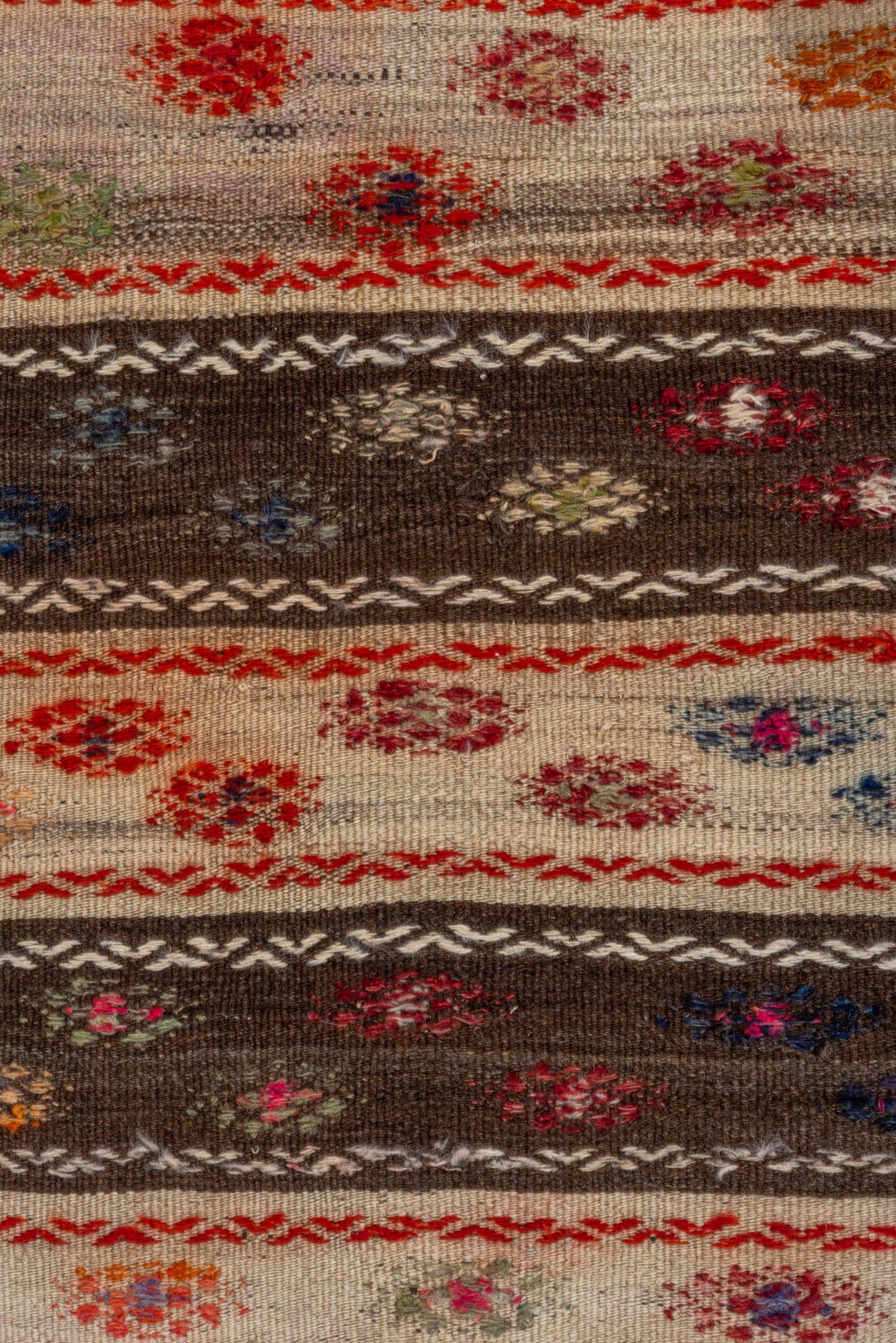 2' x 3' one-of-a-kind handmade vintage Jijim small size rug. Color palette: ivory, brown, rust, crimson, blue, olive, orange