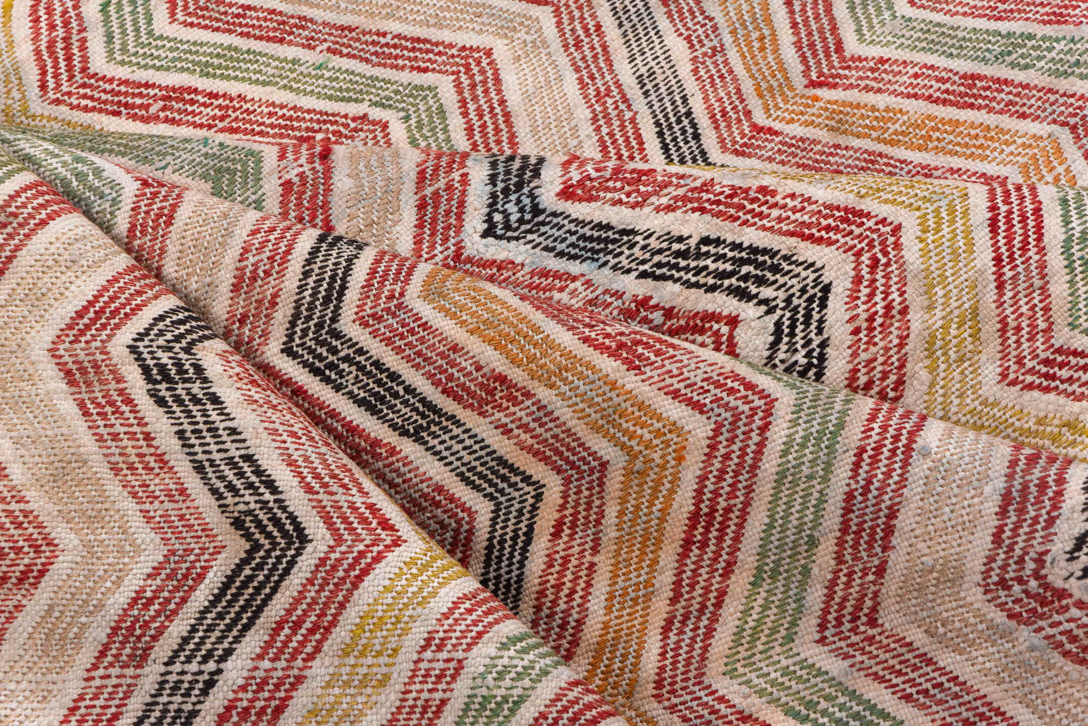 7' x 8' one-of-a-kind handmade vintage Jijim rug. Color palette: brown, ghost white, gray, light gray, off-white, pink, red