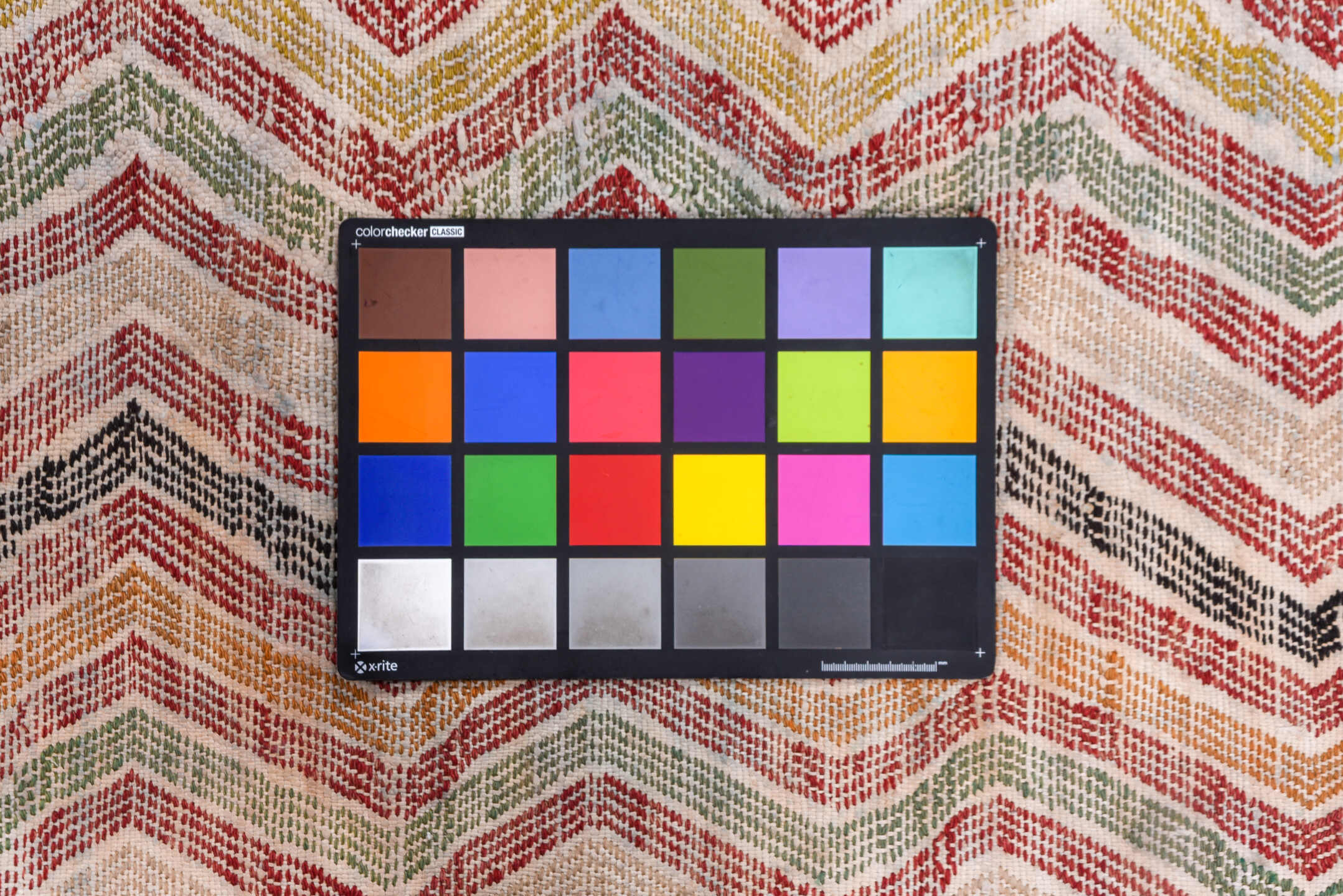 7' x 8' one-of-a-kind handmade vintage Jijim rug. Color palette: brown, ghost white, gray, light gray, off-white, pink, red