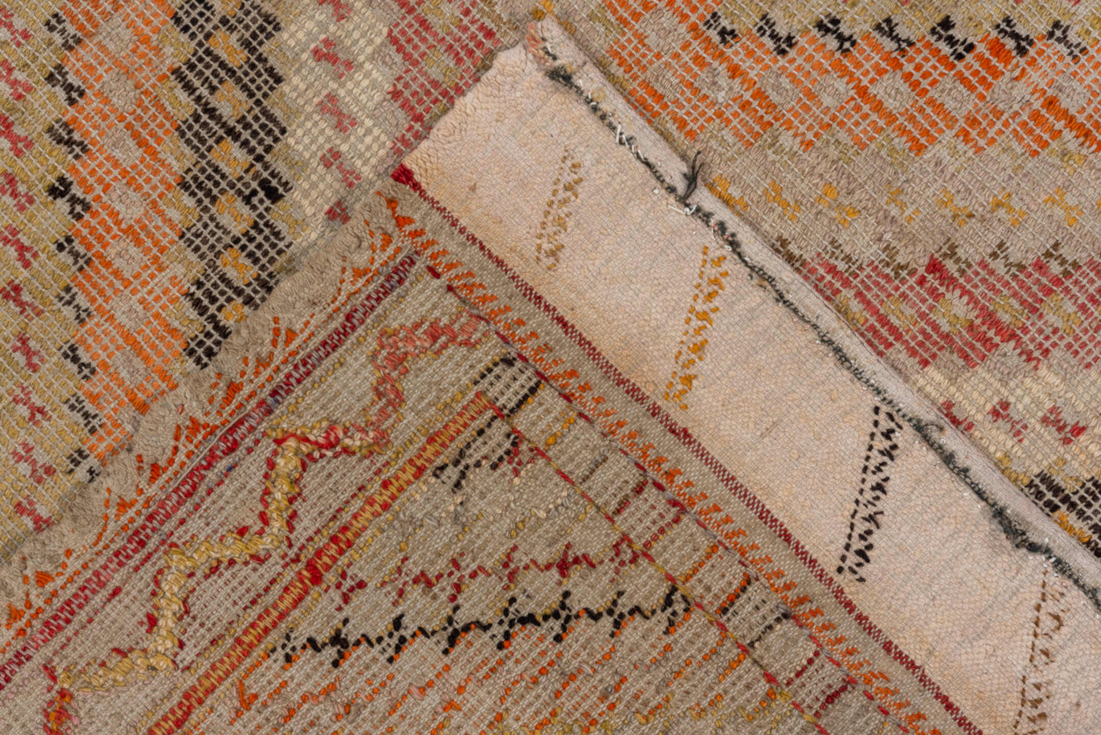 5' x 8' one-of-a-kind handmade vintage Jijim medium size rug. Color palette: brown, gray, light gray, off-white, pink