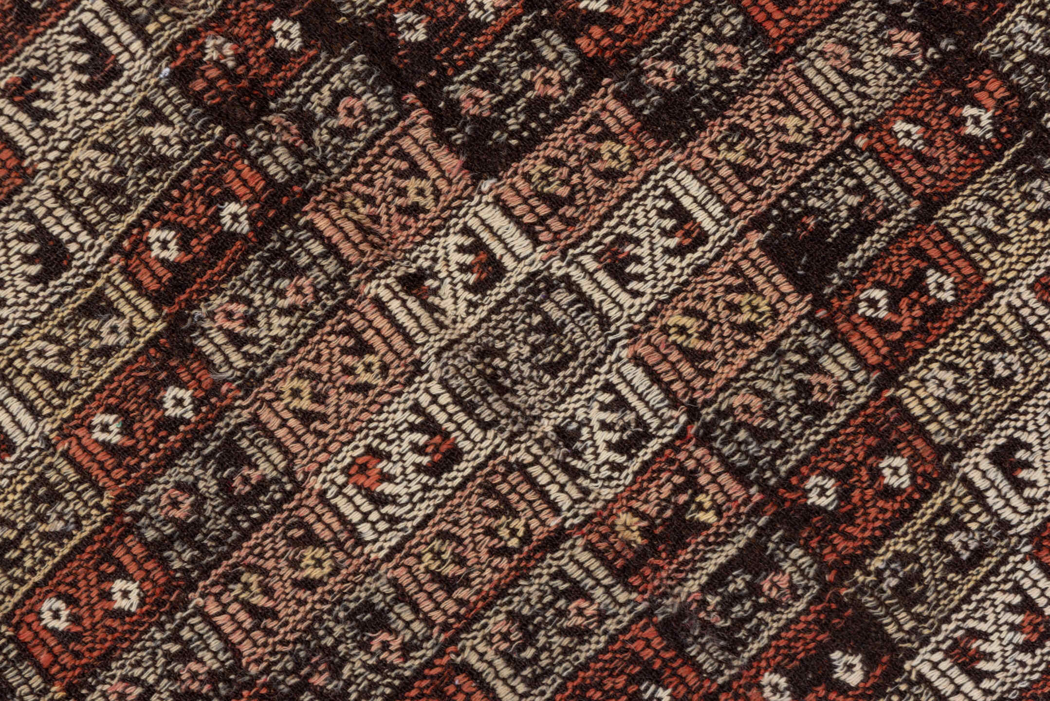 4' x 8' one-of-a-kind handmade vintage Jijim runner rug. Color palette: ivory, rust, charcoal, mahogany, brown, terracotta